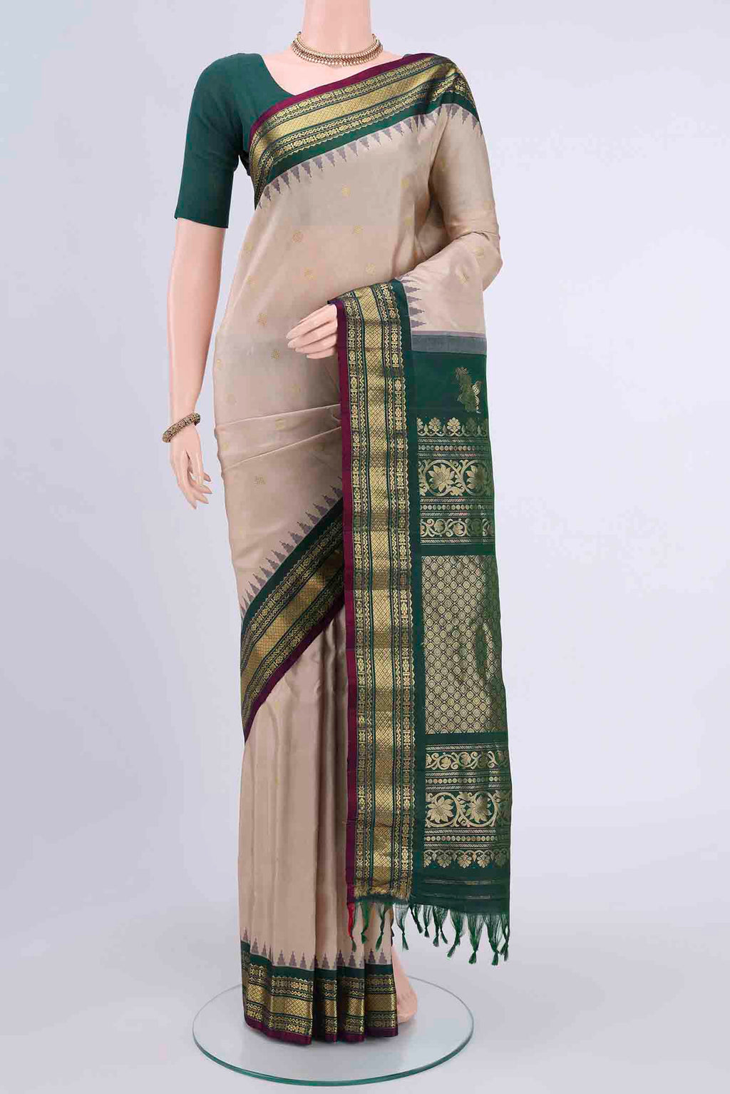 Beige Dual Tone Gadwal Silk Saree with Zari Butta on the body and Zari Border displayed on a mannequin