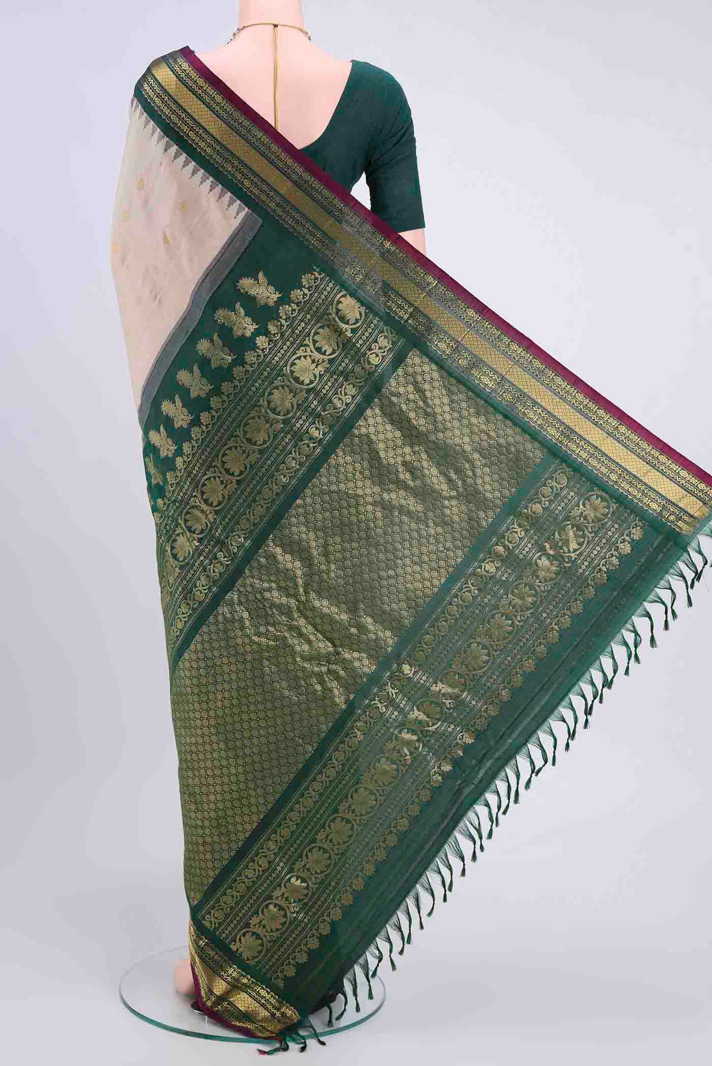 Flat view of Beige Dual Tone Gadwal Silk Saree with Zari Butta on the body and Zari Border