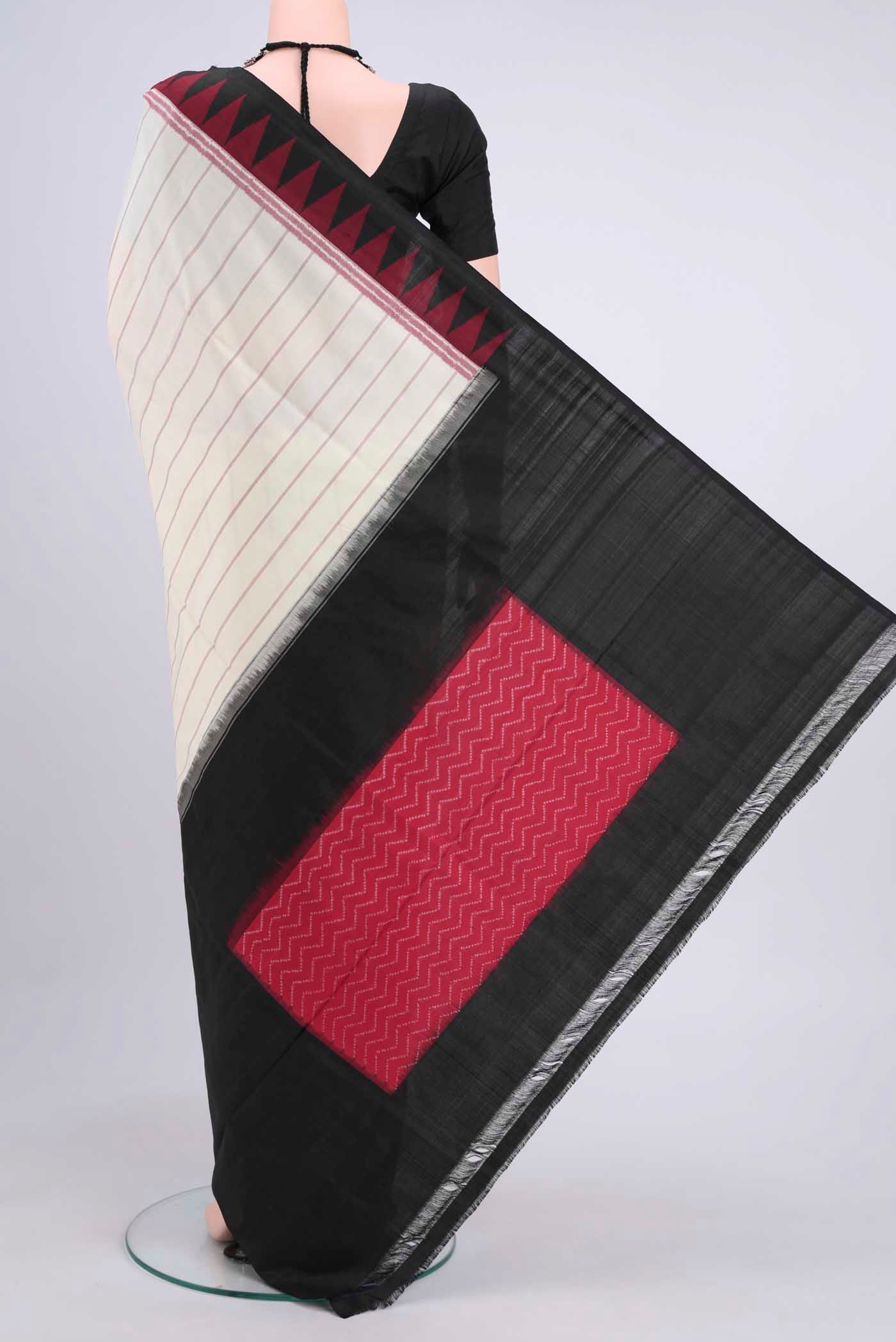 Flat view of Off White Pochampally Saree with Plain Body and Ikat Border