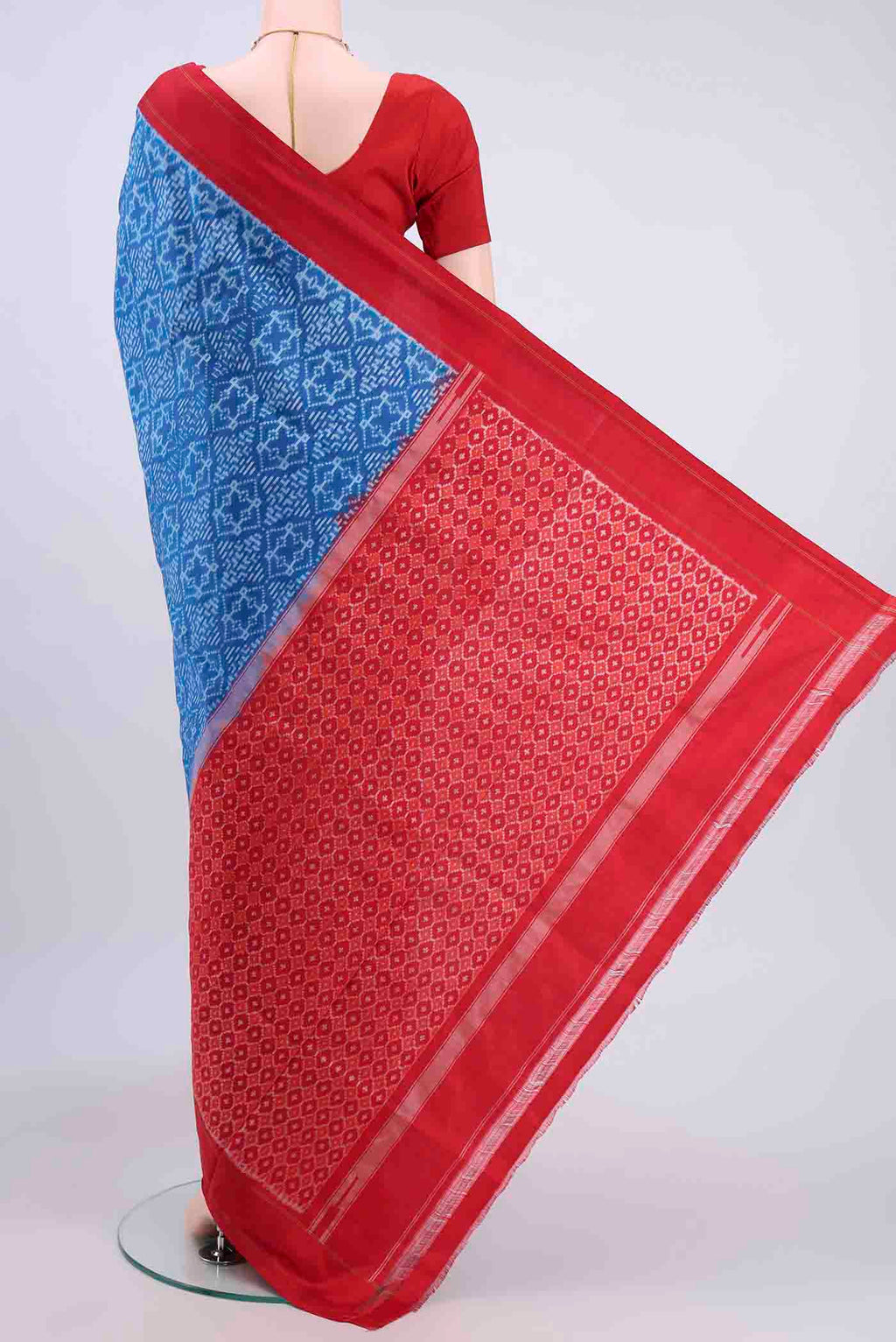 Flat view of Blue Pochampally Silk Saree with Pure Ikat on the body and Plain Border