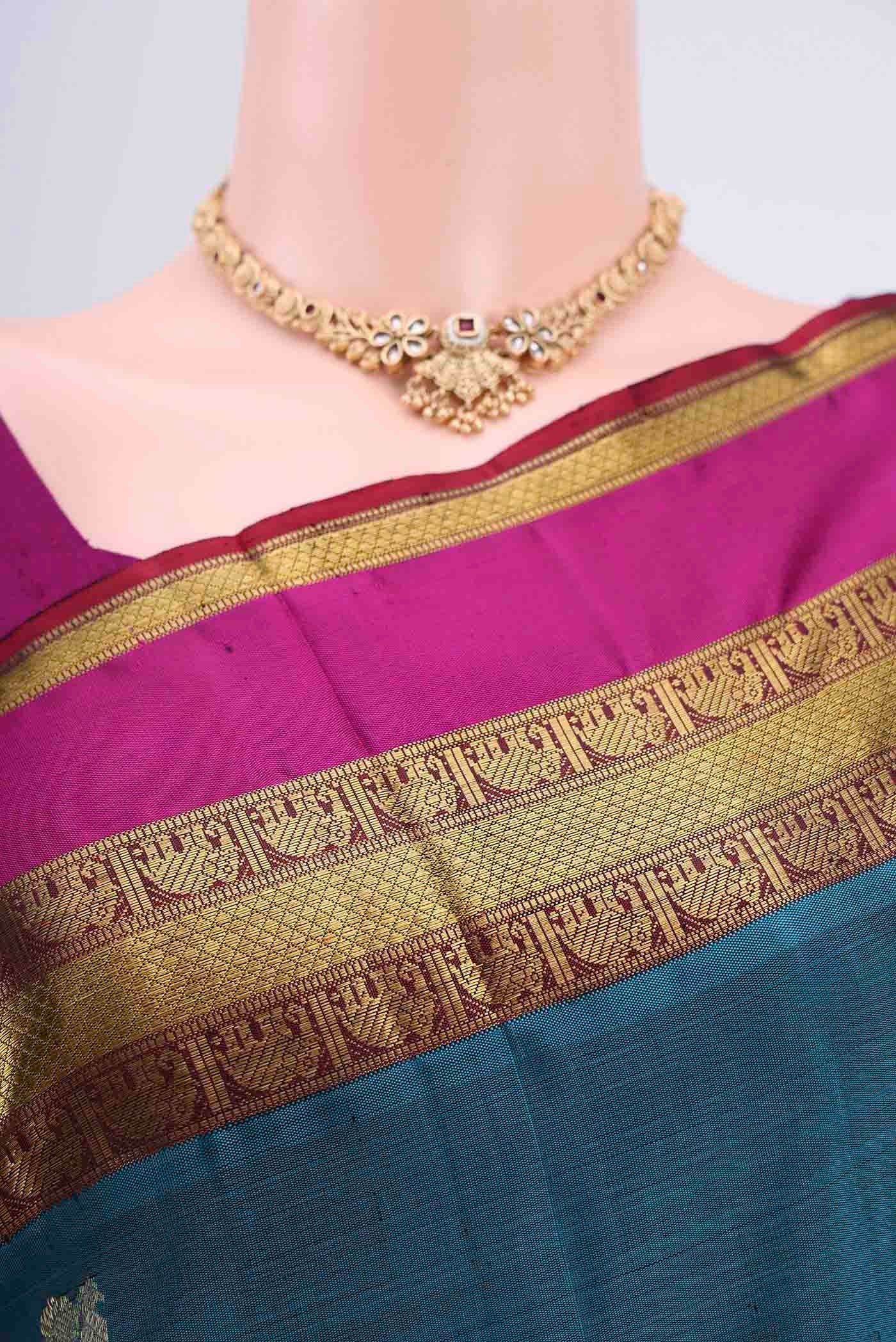 Border image of Pure Silk Pure Zari Dark Blue Kanchipuram Saree with Zari Butta on the body and Zari Border