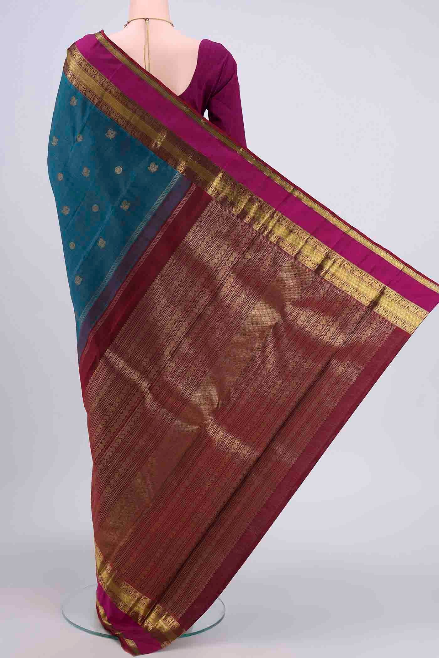 Flat view of Pure Silk Pure Zari Dark Blue Kanchipuram Saree with Zari Butta on the body and Zari Border