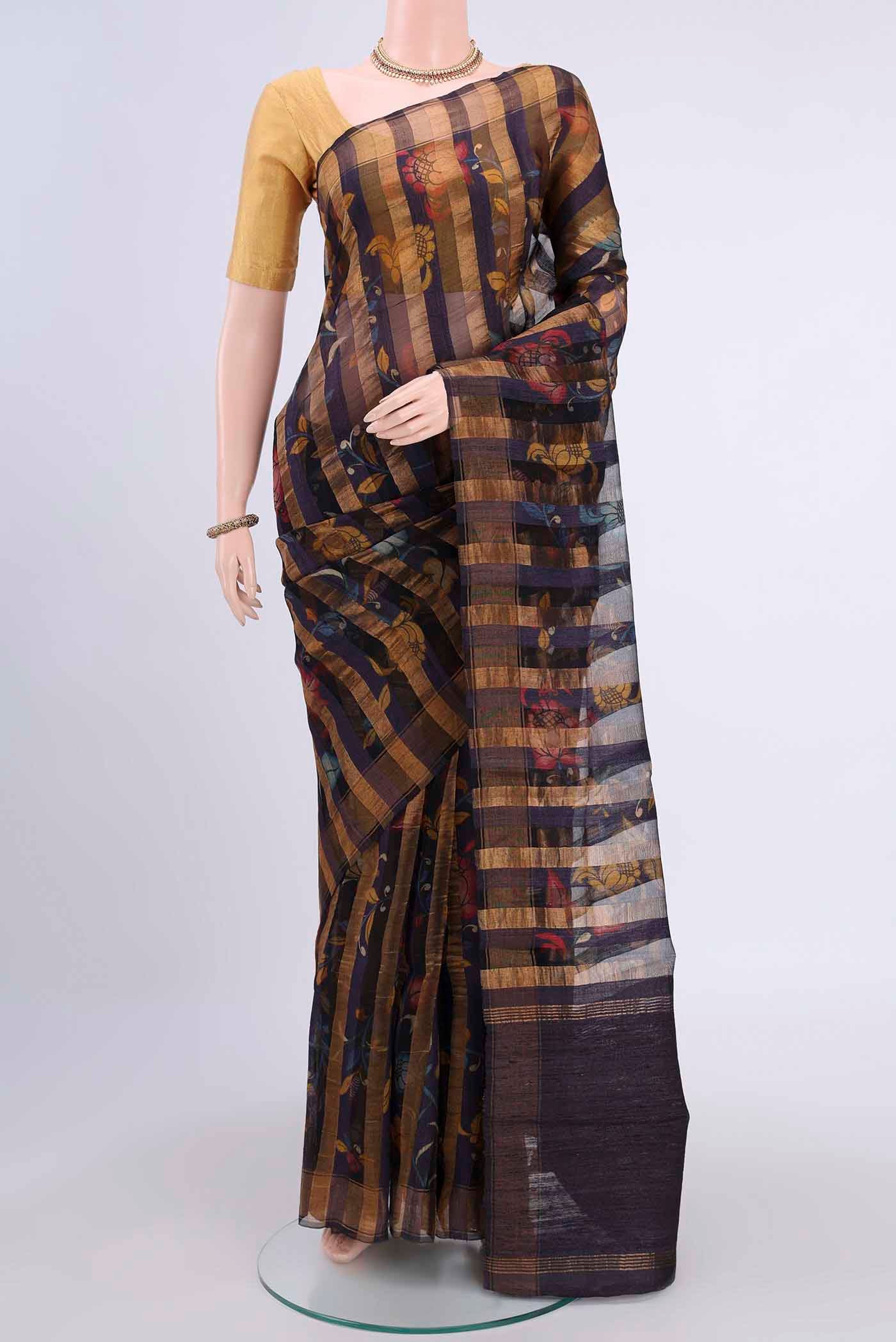 Purple Tussar Silk Saree with Floral Print on the body and Zari Border displayed on a mannequin