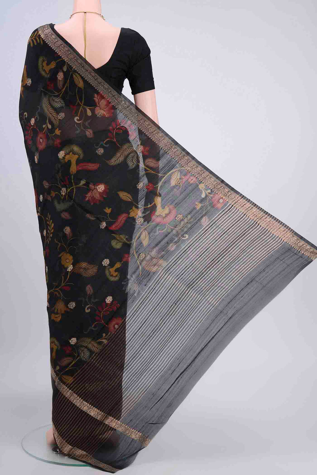 Flat view of Black Tussar Silk Saree with Printed design on the body and Printed Border