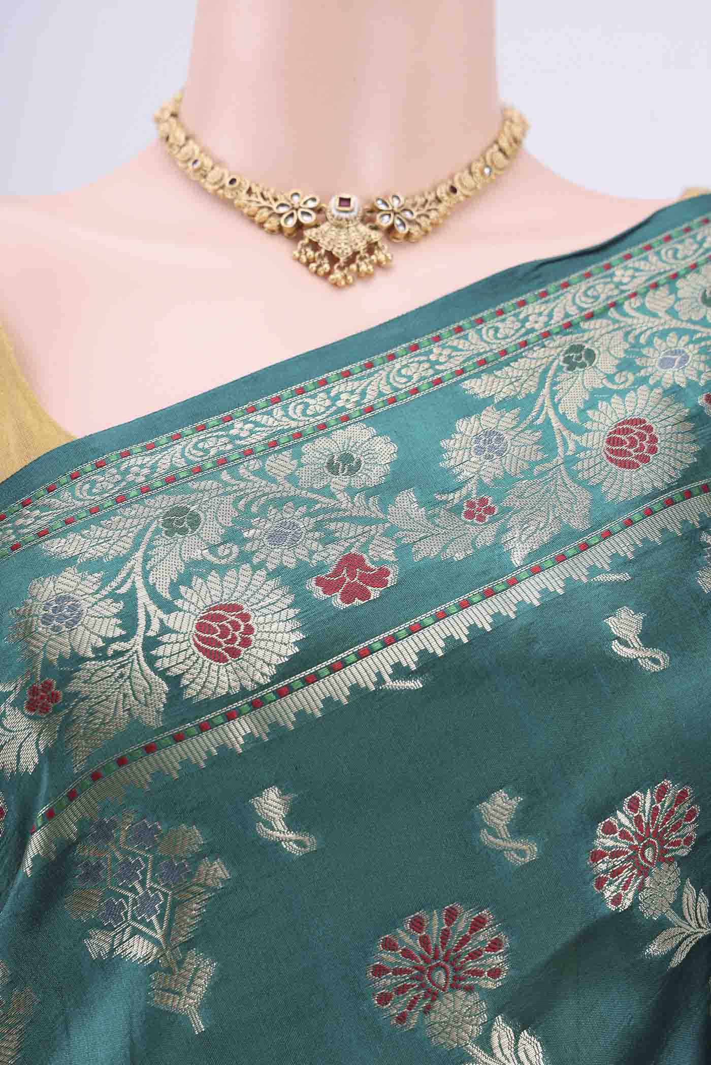 Border image of Sea Green Banarasi Raw Silk Saree with Zari Butta on the body and Zari Border. 