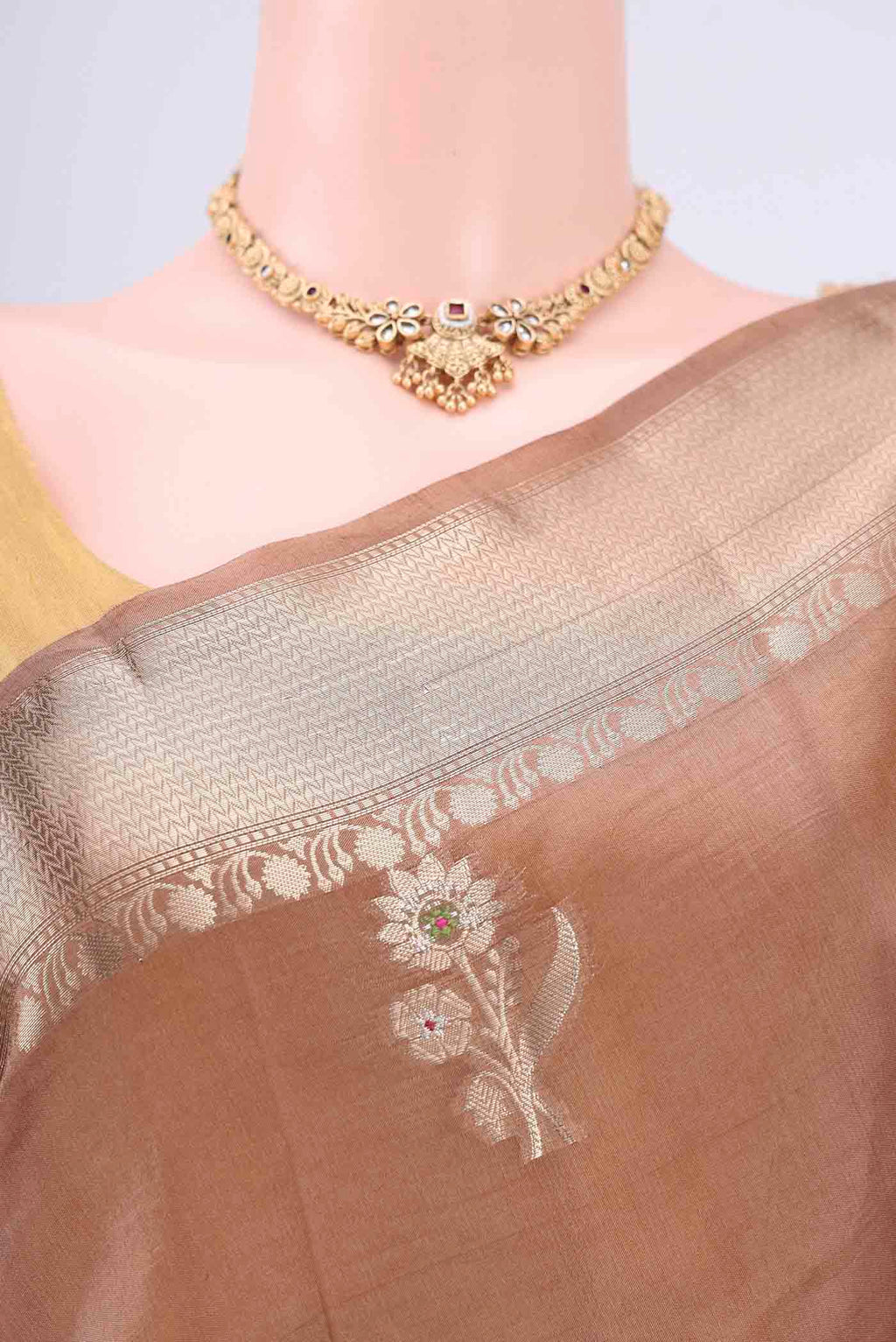 Border image of Dark Beige Banarasi Raw Silk Saree with Zari Butta on the body and Zari Border. 