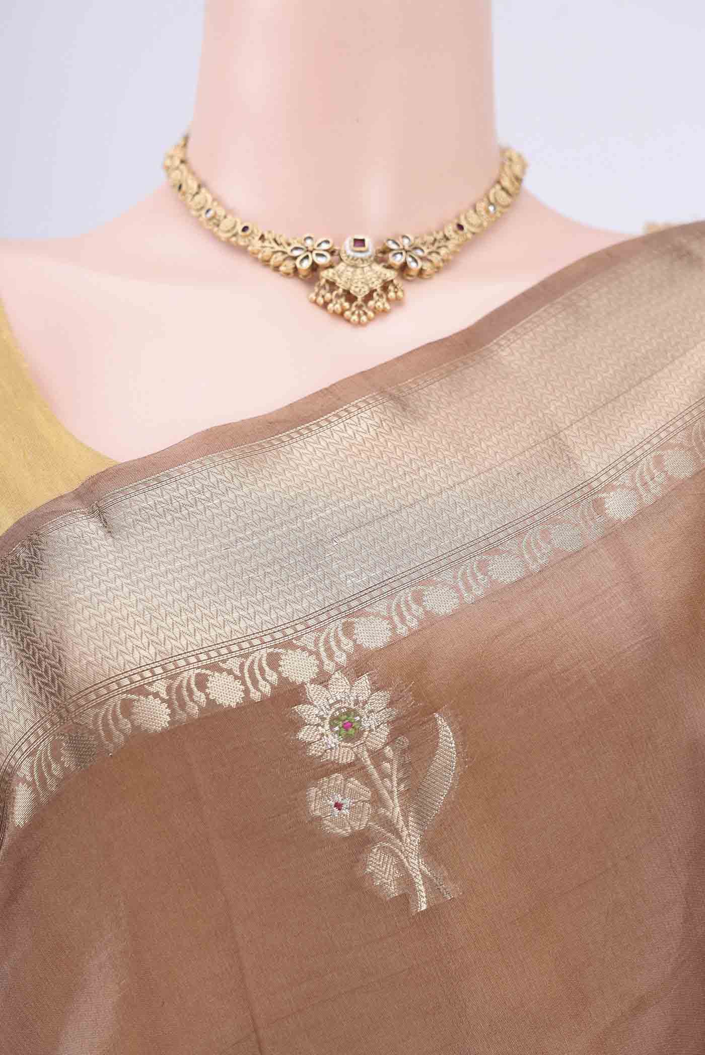 Border image of Dark Beige Banarasi Raw Silk Saree with Zari Butta on the body and Zari Border. 