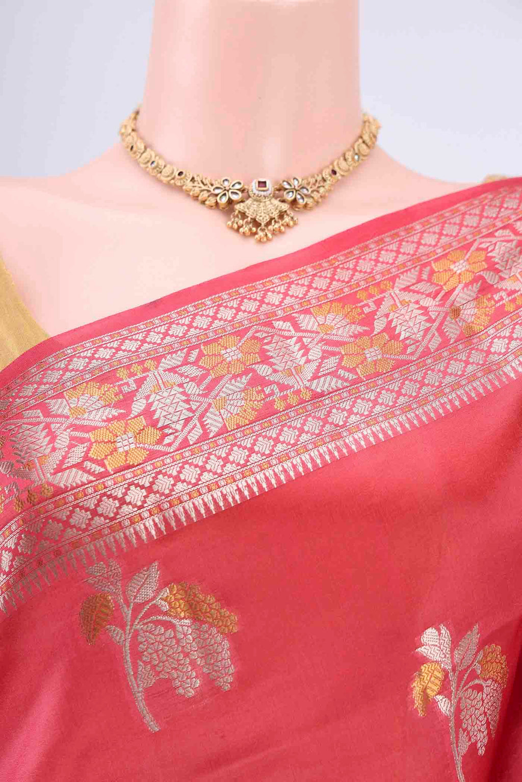 Border image of Peach Banarasi Raw Silk Saree with Zari Butta on the body and Zari Border. 