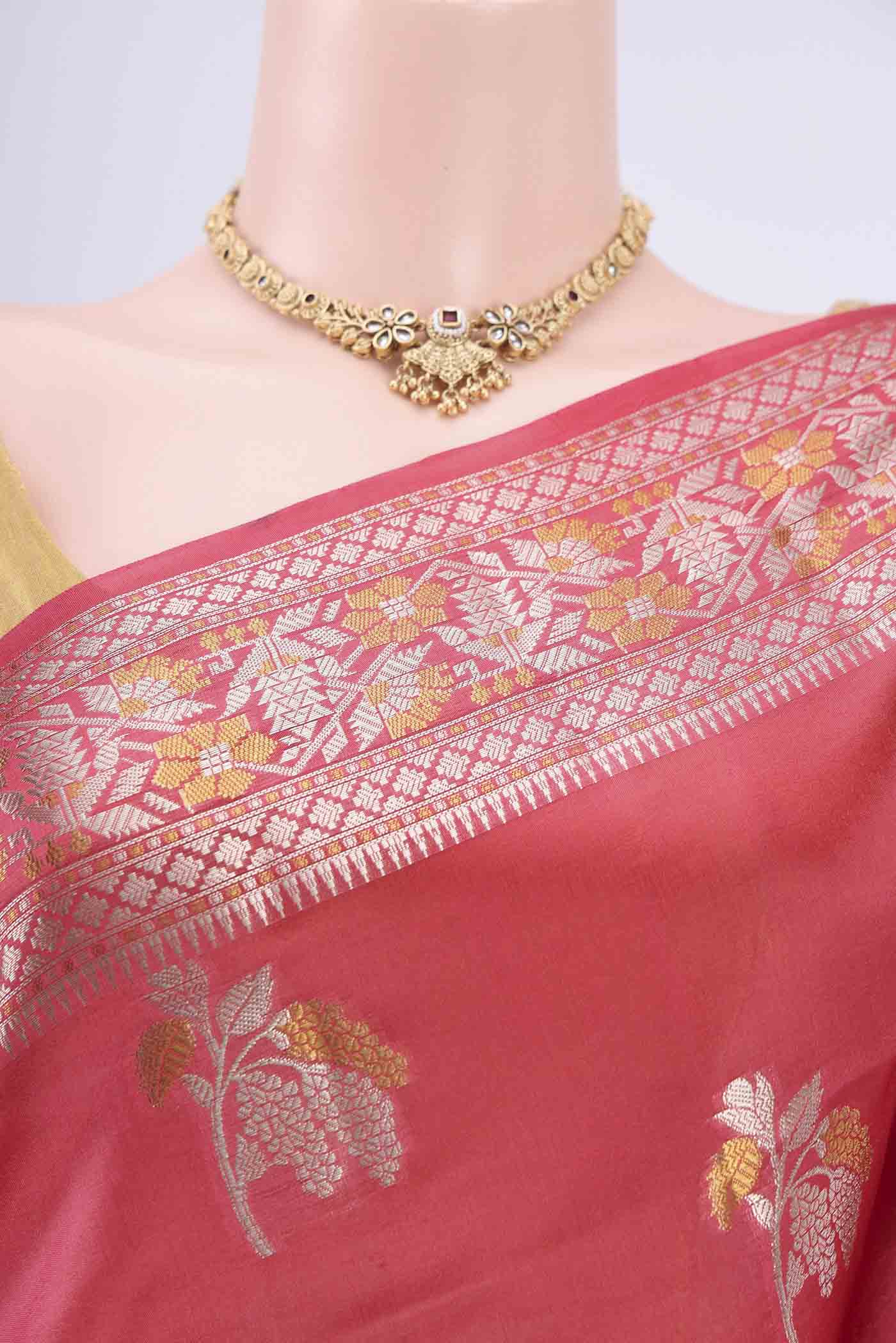 Border image of Peach Banarasi Raw Silk Saree with Zari Butta on the body and Zari Border. 