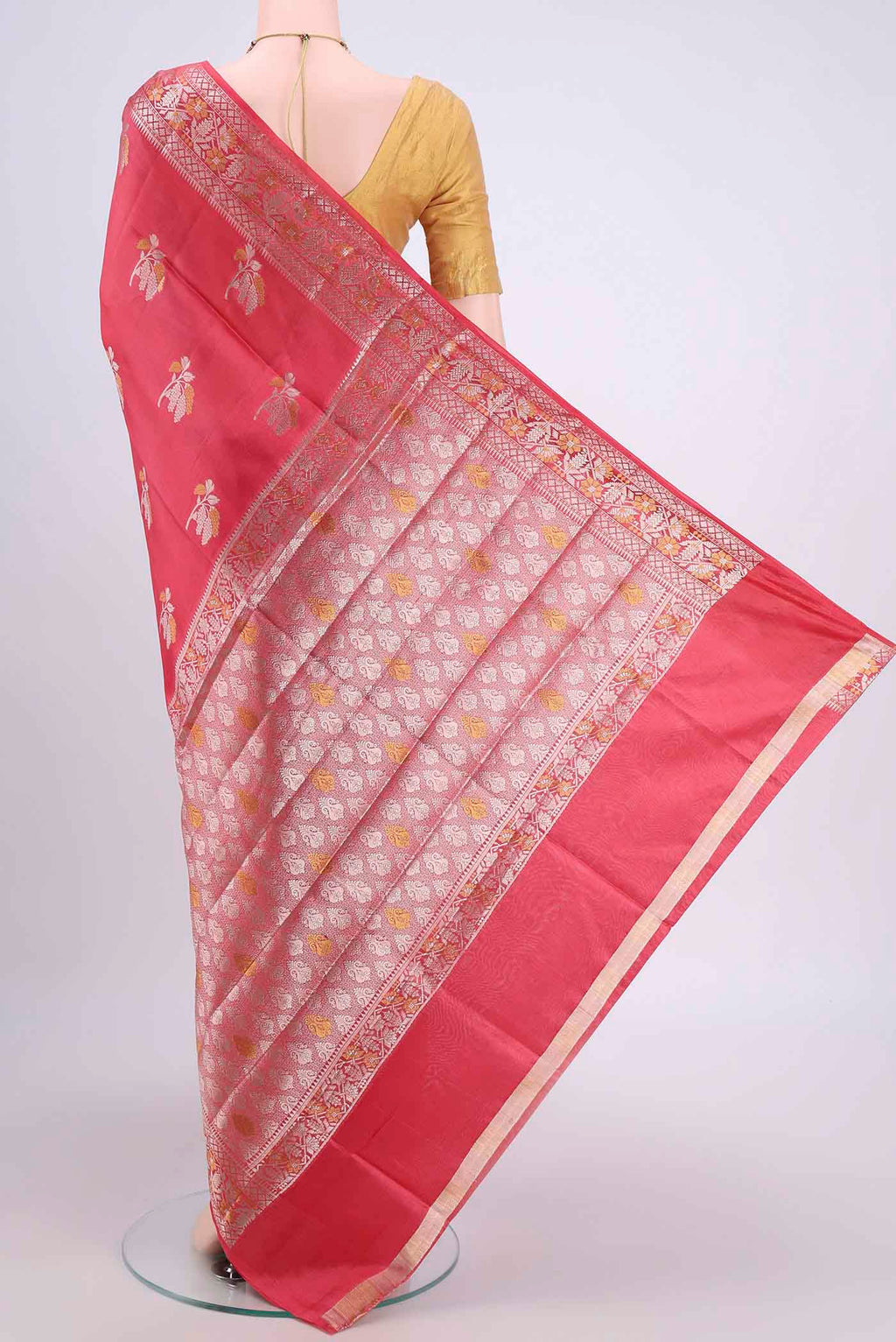 Flat view of Peach Banarasi Raw Silk Saree with Zari Butta on the body and Zari Border. 