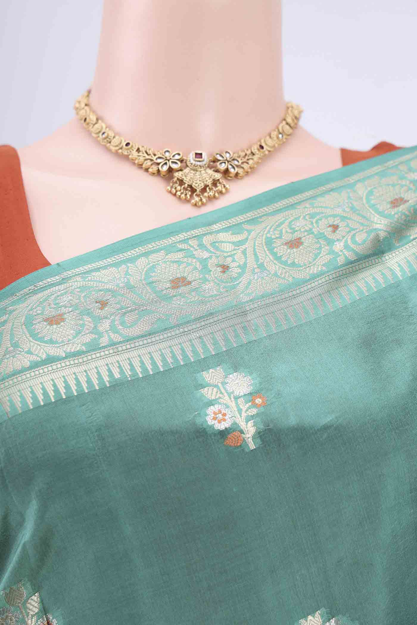 Border image of Sea Green Banarasi Raw Silk Saree with Zari Brocade on the body and Zari Border. 