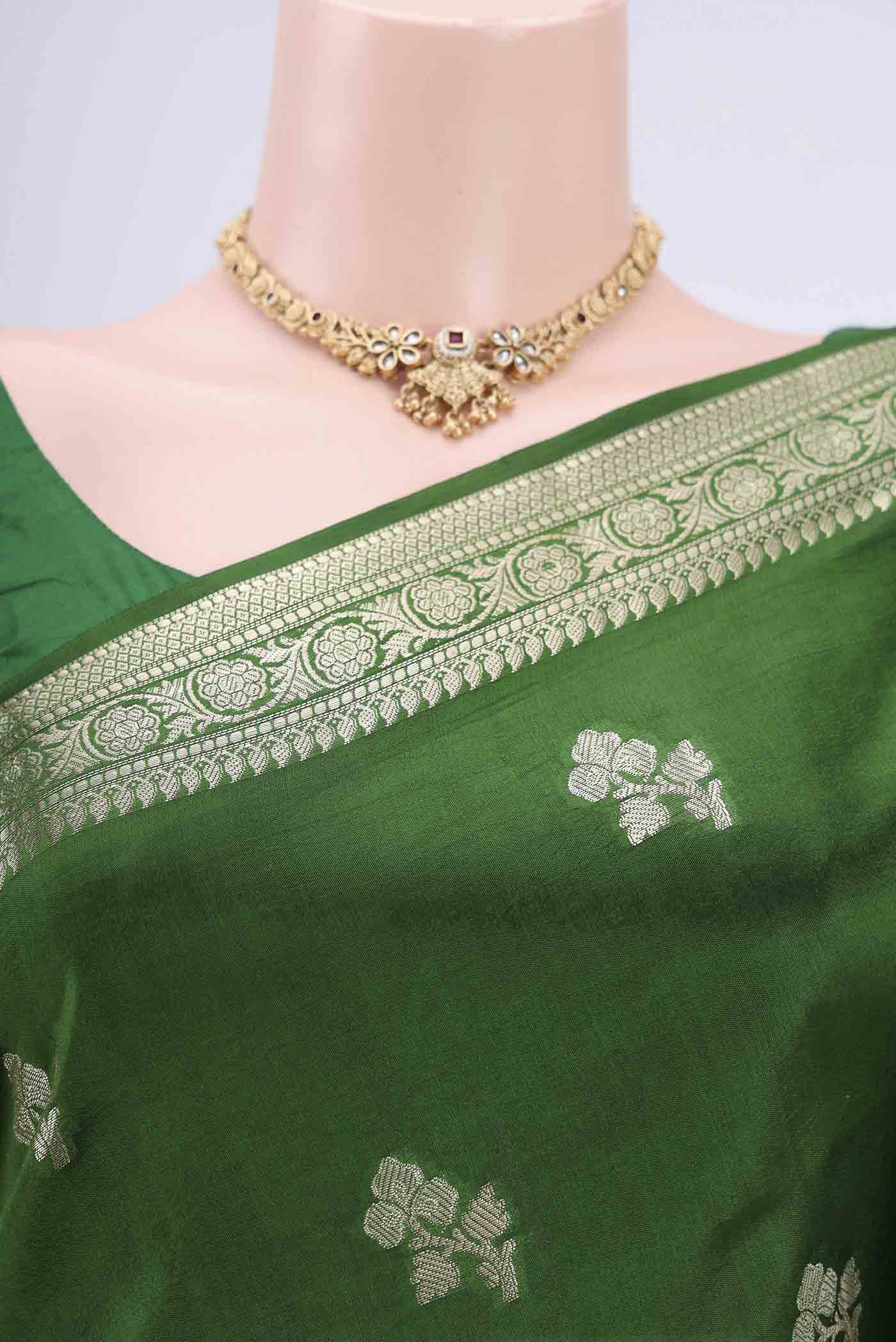 Border image of Green Banarasi Raw Silk Saree with Zari Butta on the body and Zari Border. 