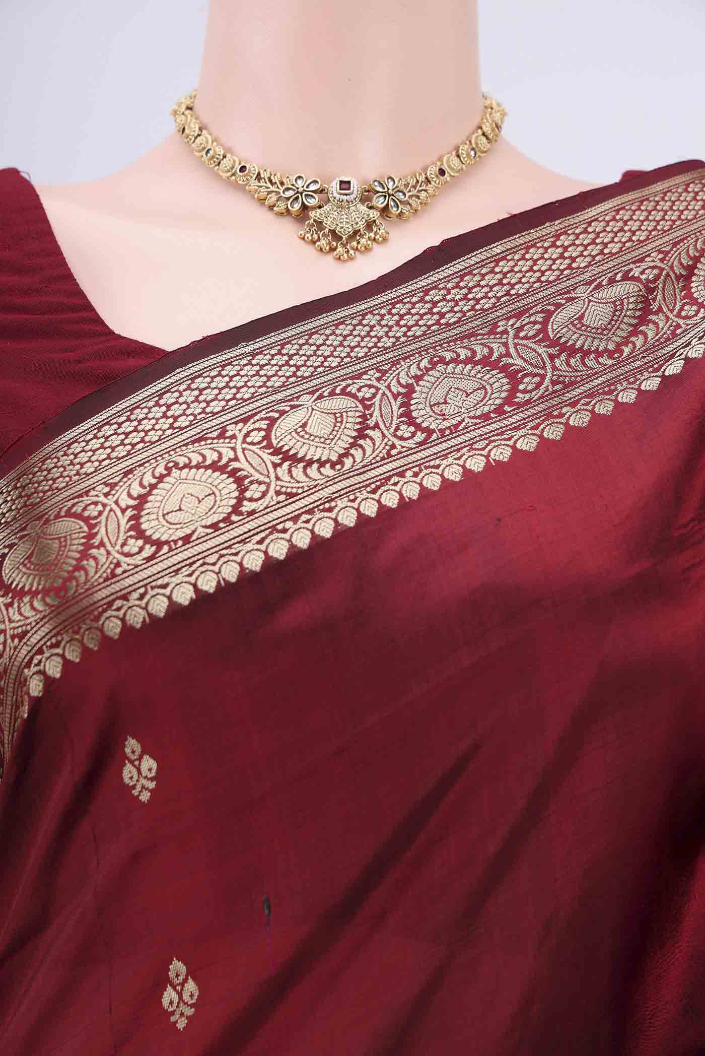 Border image of Maroon Banarasi Katan Silk Saree with Zari Butta on the body and Zari Border. 
