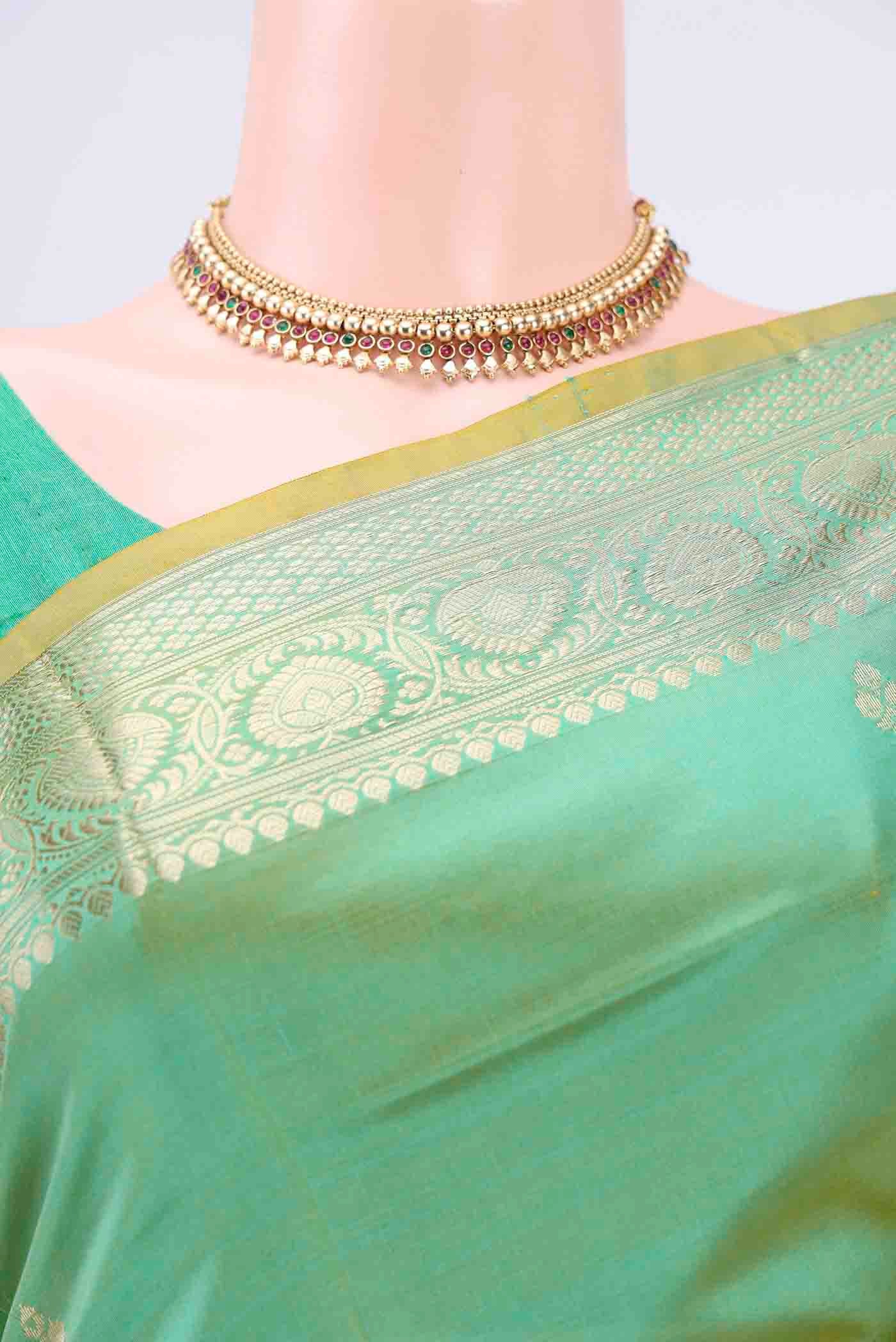 Border image of Acid Green Dual Tone Banarasi Katan Silk Saree with Zari Butta on the body and Zari Border. 
