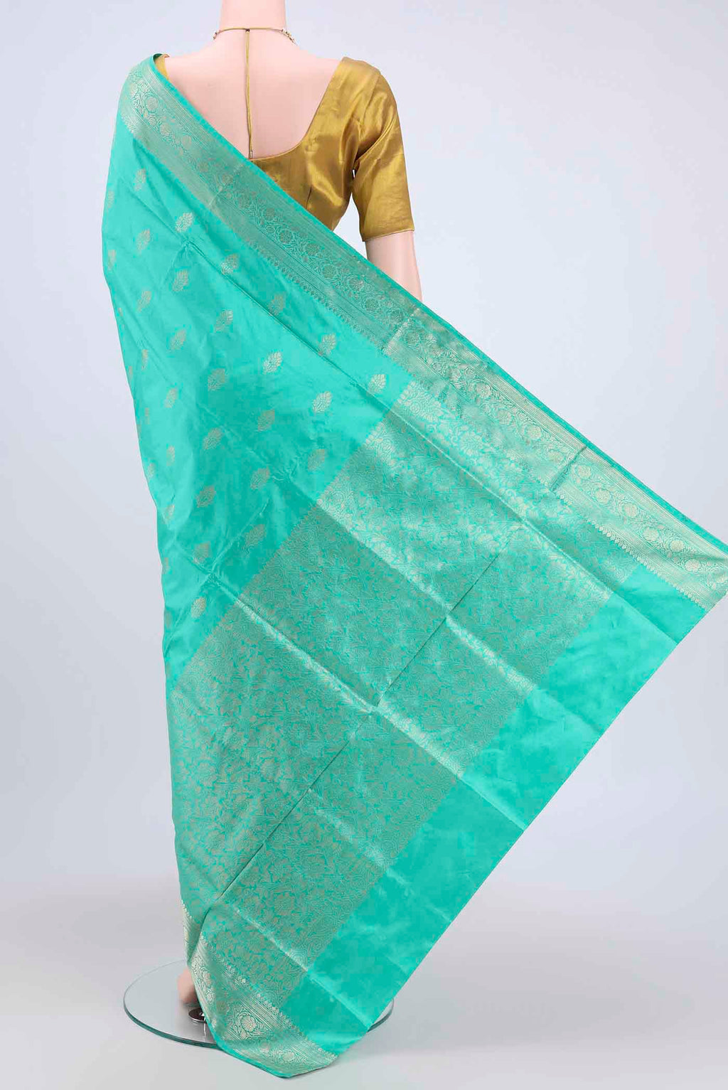 Flat view of Turquoise Dual Tone Banarasi Katan Silk Saree with Thread Butta on the body and Thread Border. 