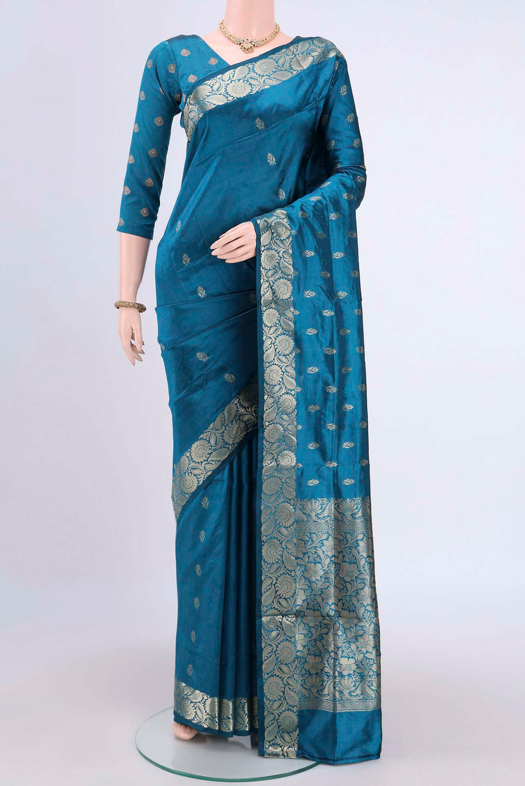 Dark Blue Dual Tone Banarasi Katan Silk Saree with Zari Butta on the body and Zari Border.  displayed on a mannequin
