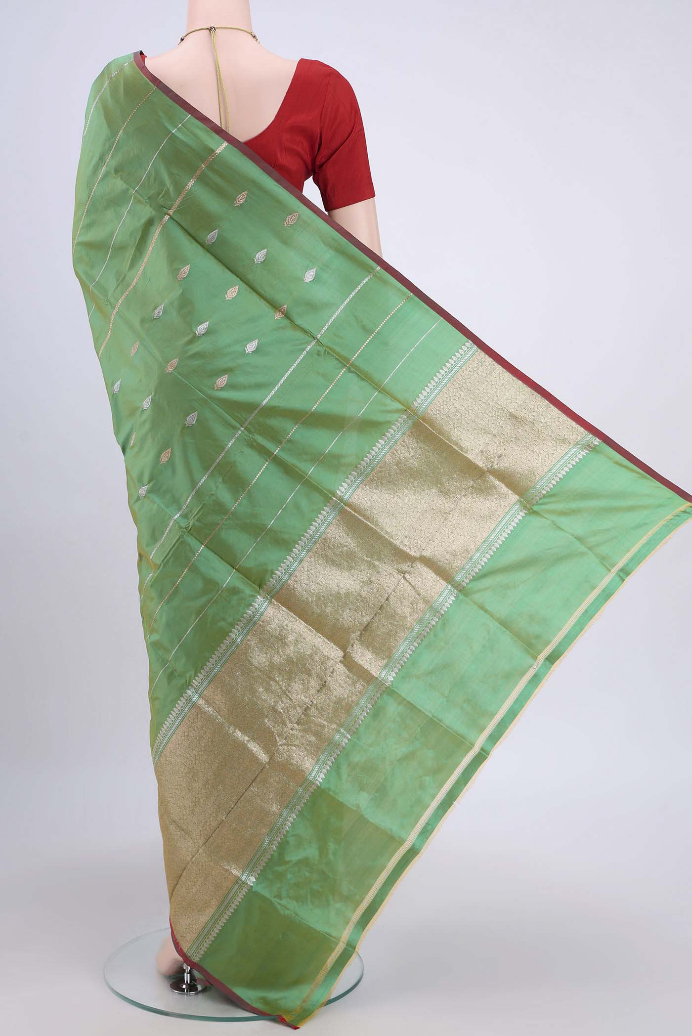 Flat view of Acid Green Dual Tone Banarasi Katan Silk Saree with Zari Butta on the body and Zari Border. 