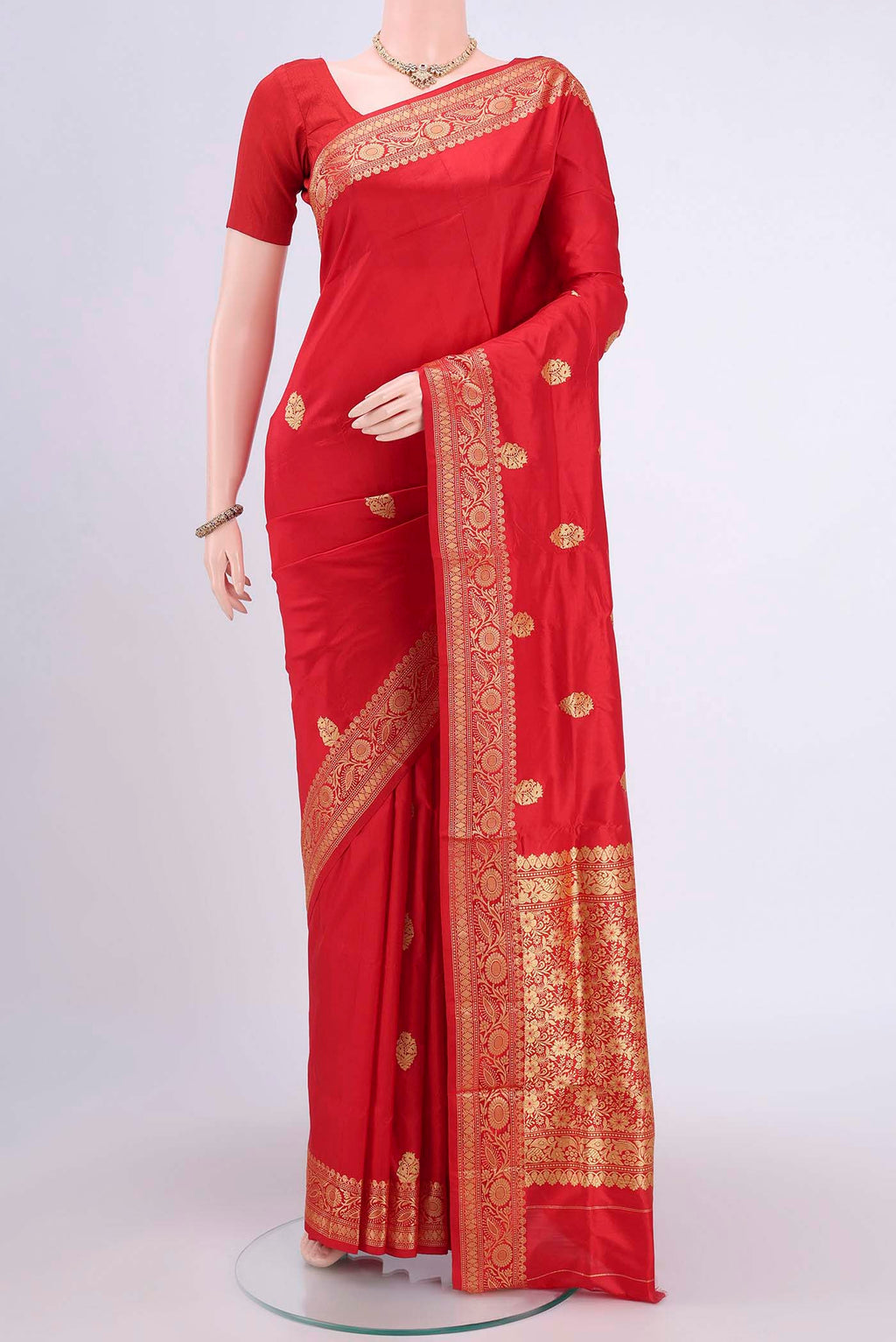 Red Dual Tone Banarasi Katan Silk Saree with Thread Butta on the body and Thread Border.  displayed on a mannequin