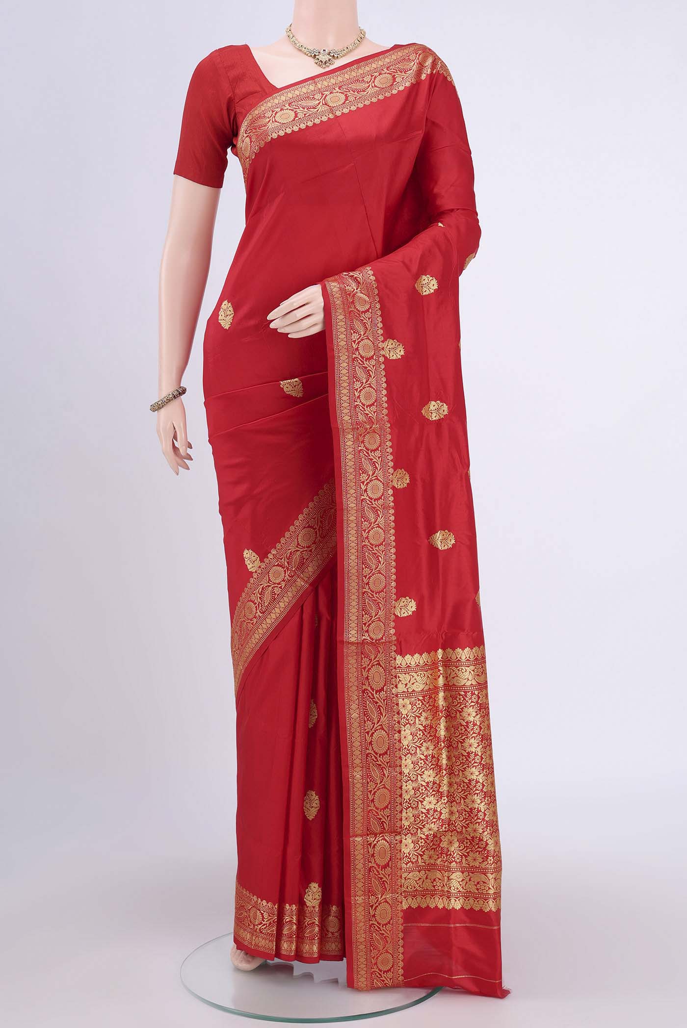 Red Dual Tone Banarasi Katan Silk Saree with Thread Butta on the body and Thread Border.  displayed on a mannequin