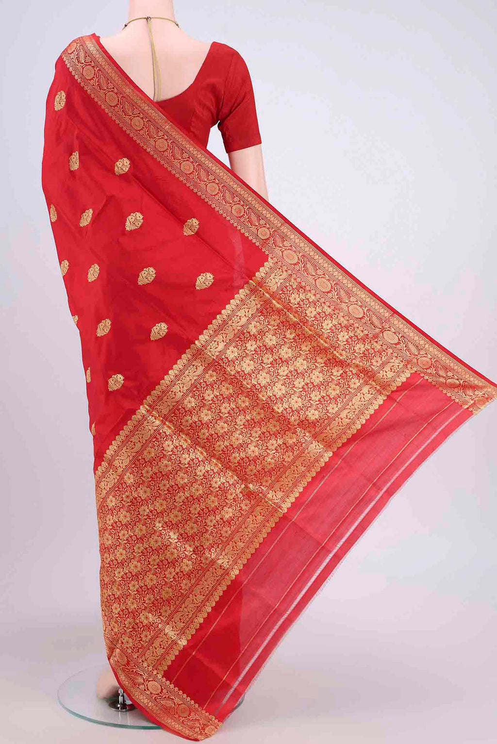 Flat view of Red Dual Tone Banarasi Katan Silk Saree with Thread Butta on the body and Thread Border. 