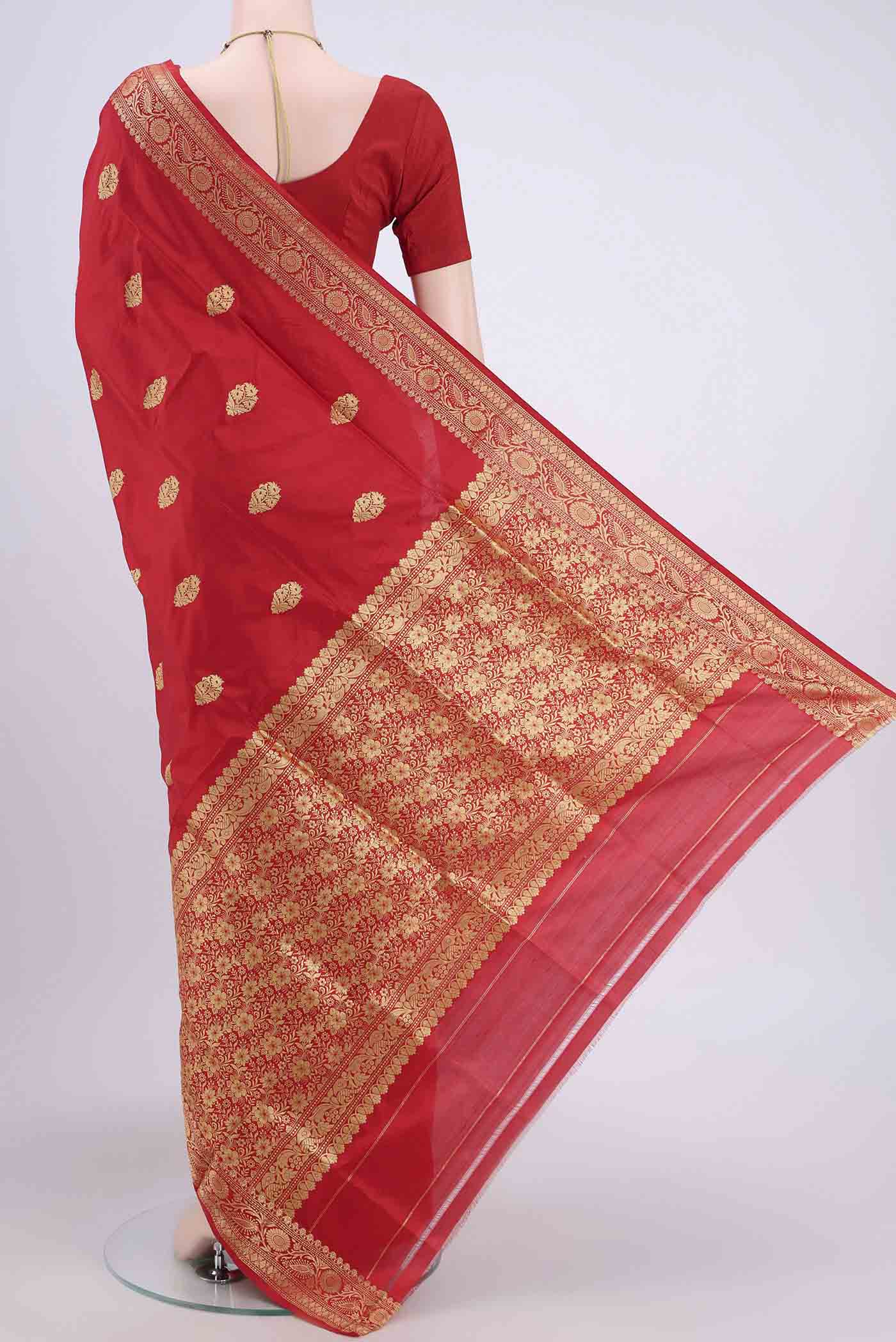 Flat view of Red Dual Tone Banarasi Katan Silk Saree with Thread Butta on the body and Thread Border. 
