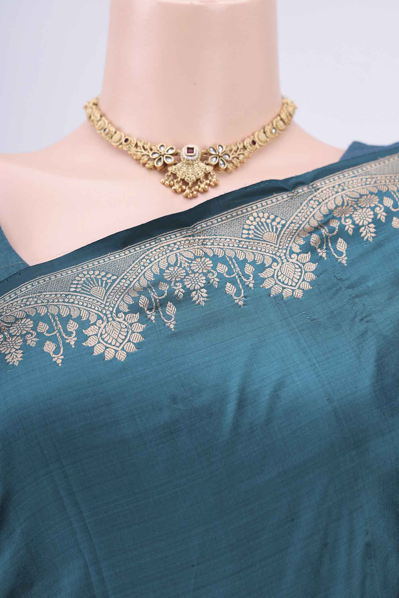 Border image of Sea Green Banarasi Katan Silk Saree with Zari Butta on the body and Zari Border. 