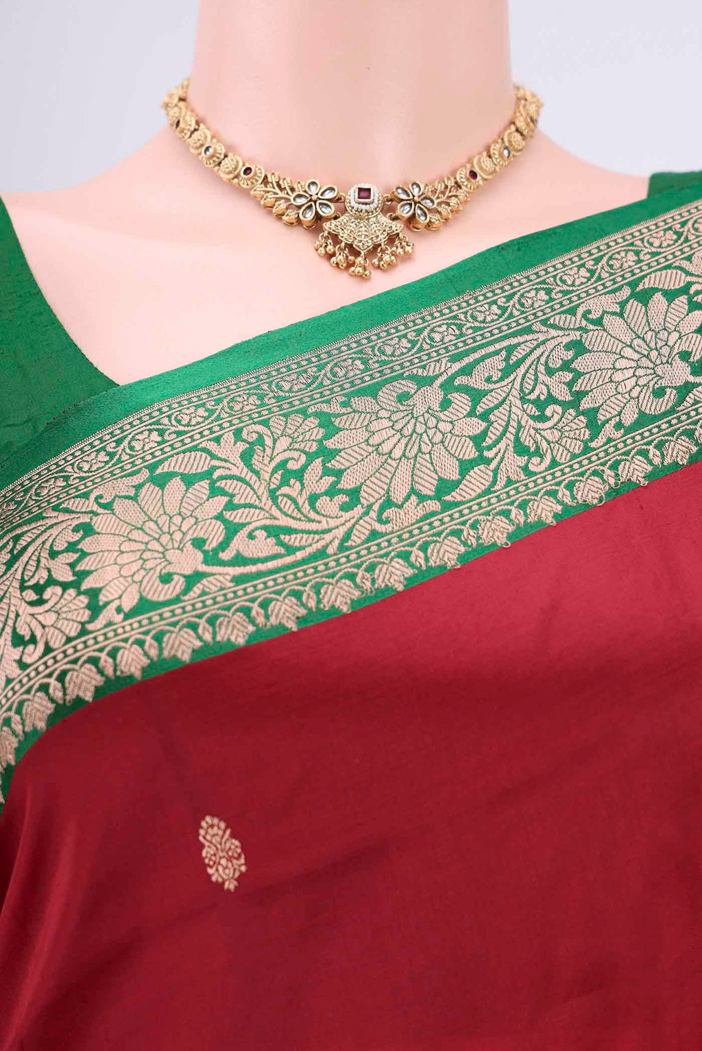 Border image of Maroon Banarasi Katan Silk Saree with Zari Butta on the body and Zari Border. 