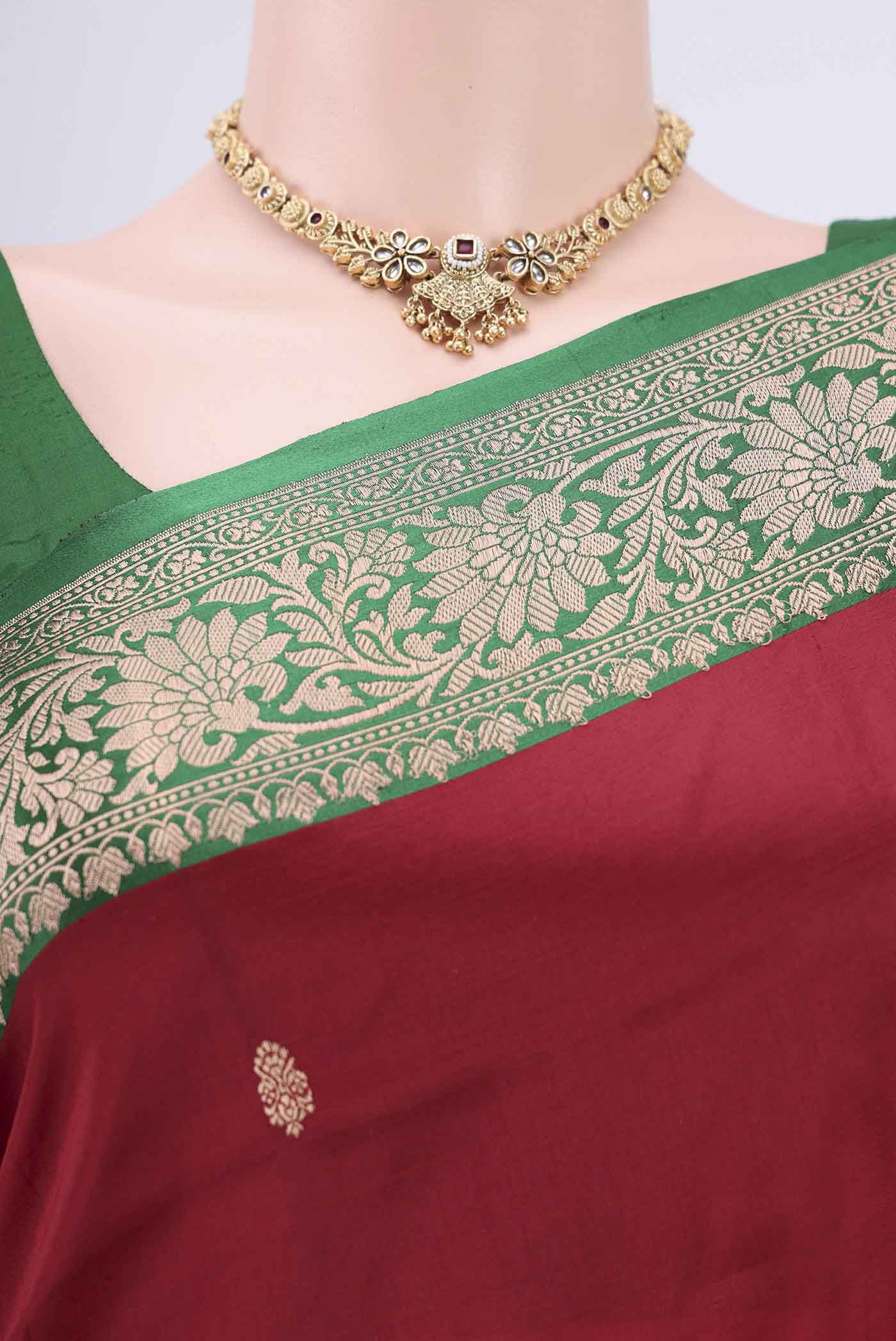 Border image of Maroon Banarasi Katan Silk Saree with Zari Butta on the body and Zari Border. 