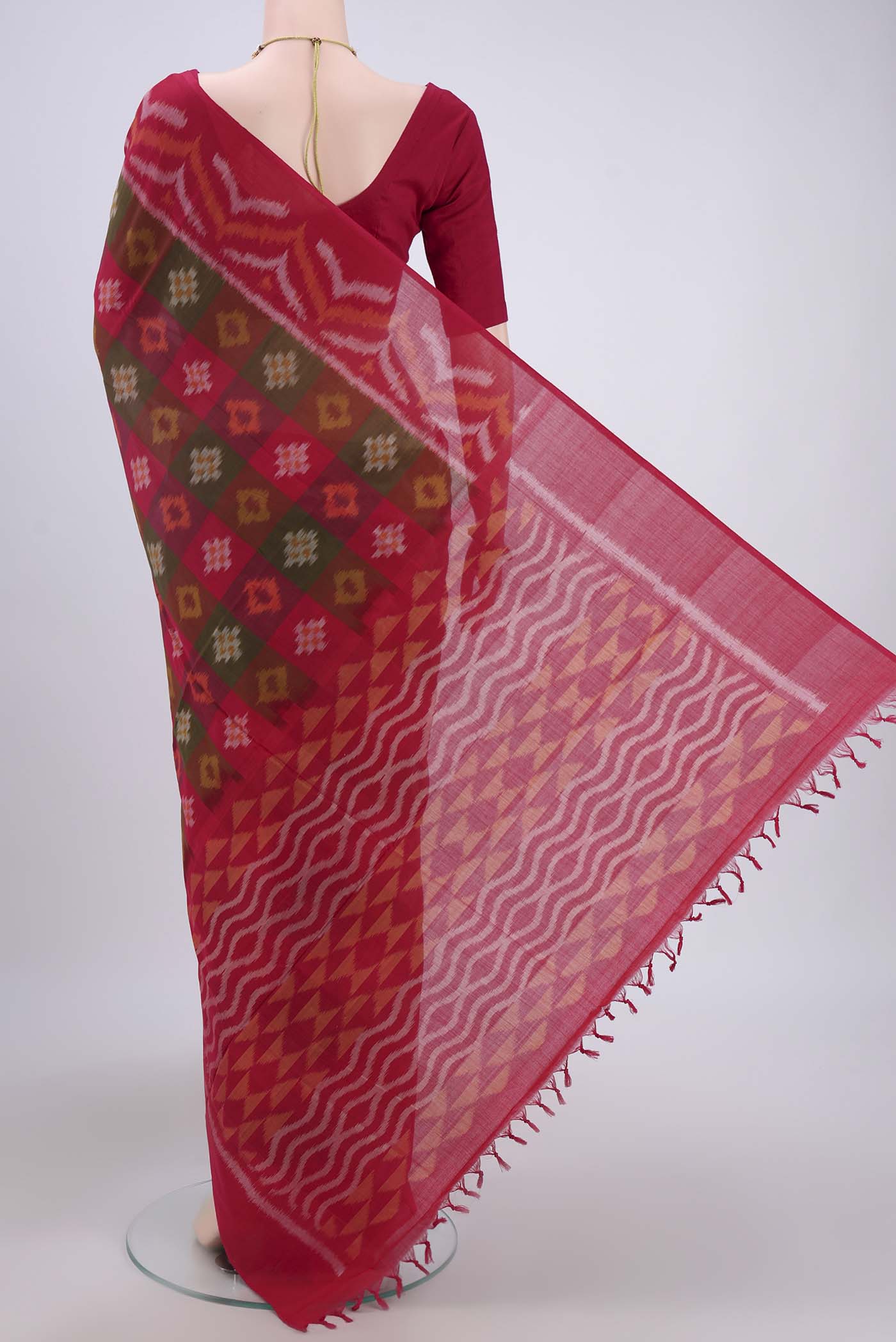 Flat view of Multi Color Pochampally Cotton Saree with Ikat design on the body and Ikat Border. 