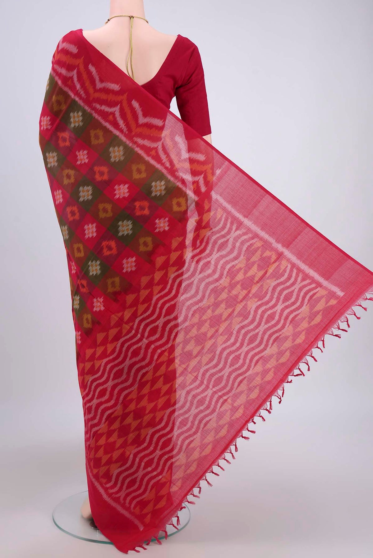 Flat view of Multi Color Pochampally Cotton Saree with Ikat design on the body and Ikat Border. 
