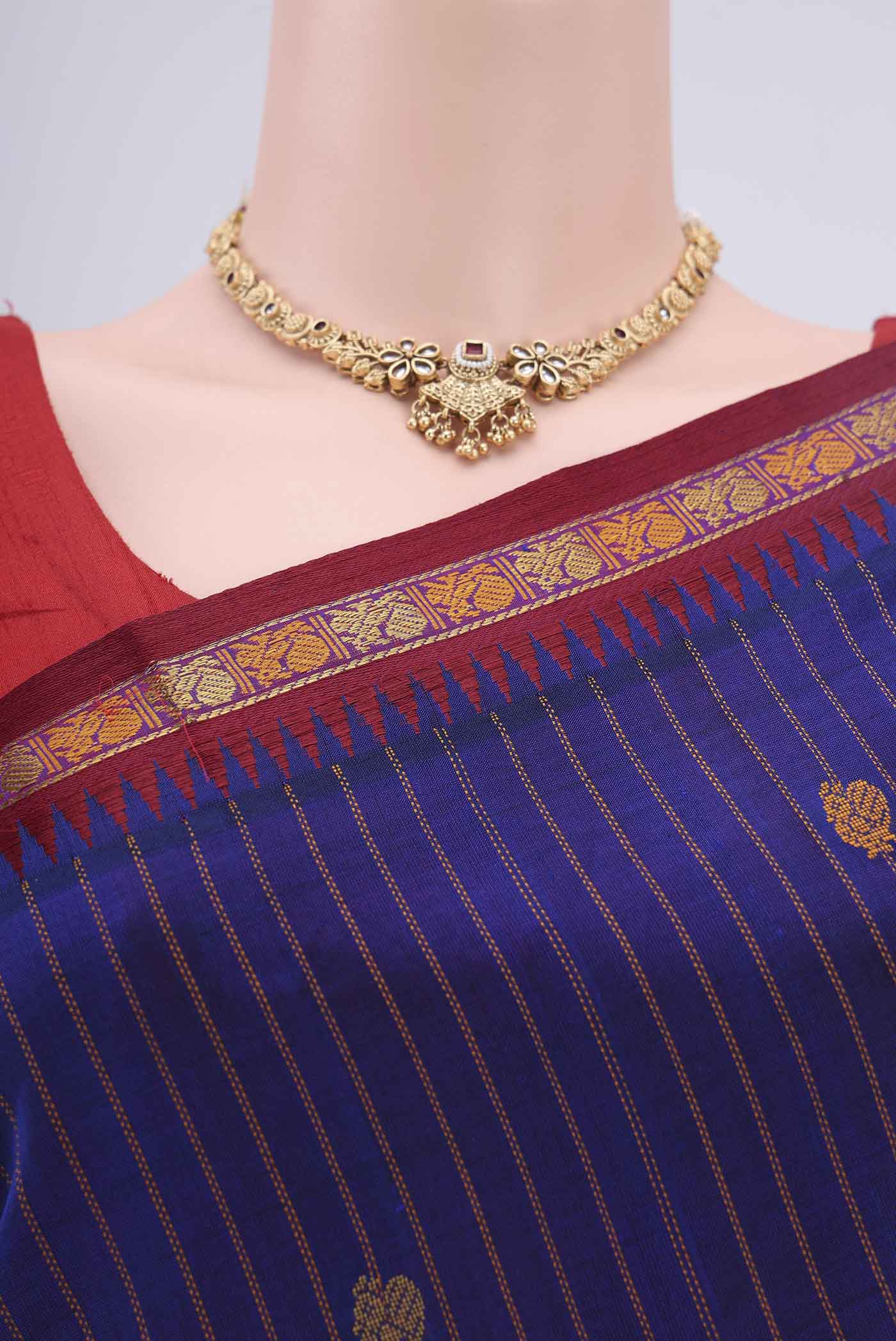 Border image of Royal Blue Blended Coimbatore Silk Cotton Saree with Stripes on the body and Plain Border. 