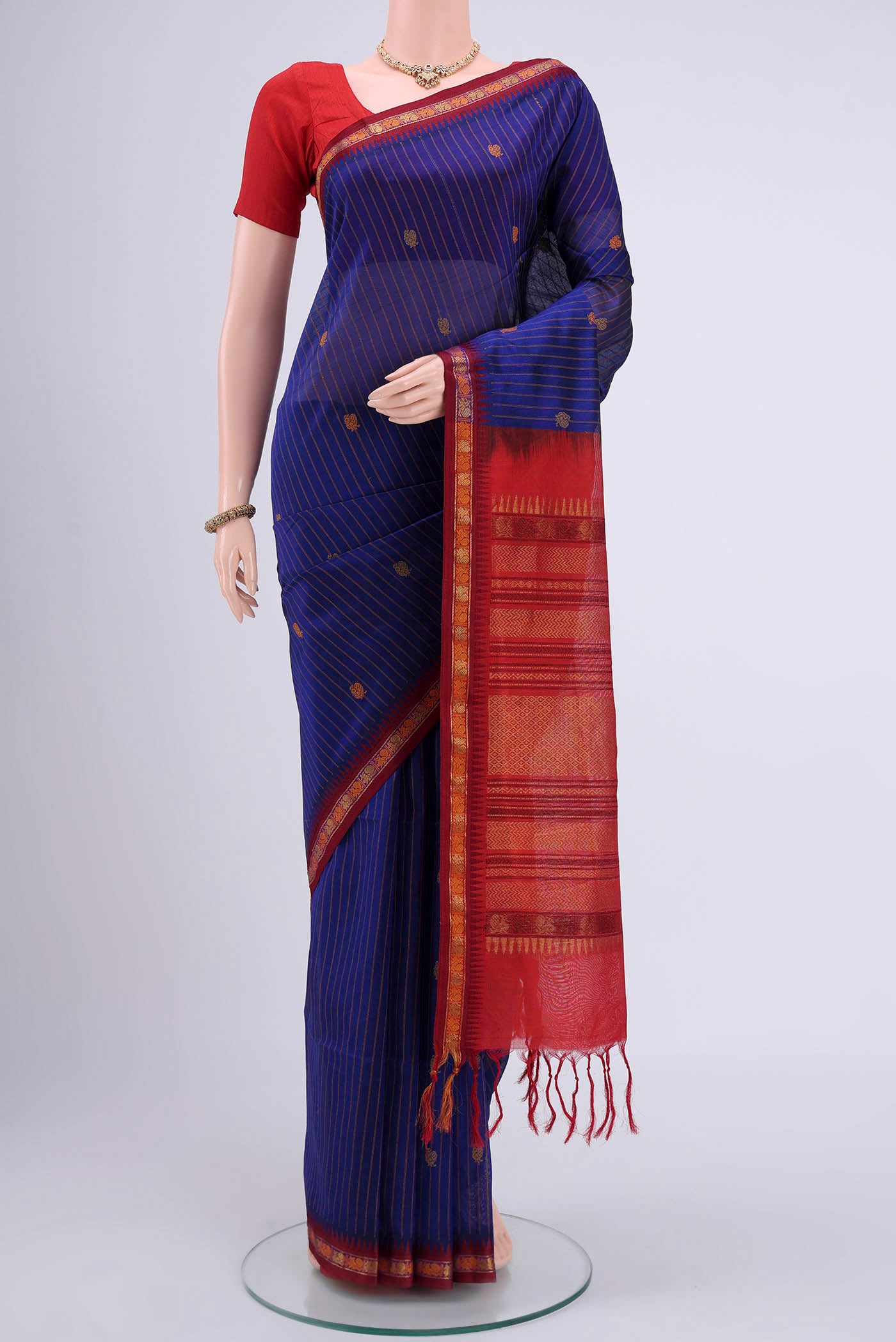 Royal Blue Blended Coimbatore Silk Cotton Saree with Stripes on the body and Plain Border.  displayed on a mannequin