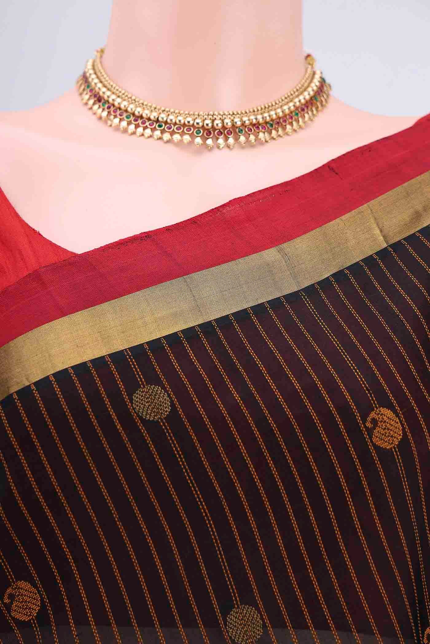 Border image of Black Coimbatore Silk Cotton Saree with Stripes on the body and Plain Border
