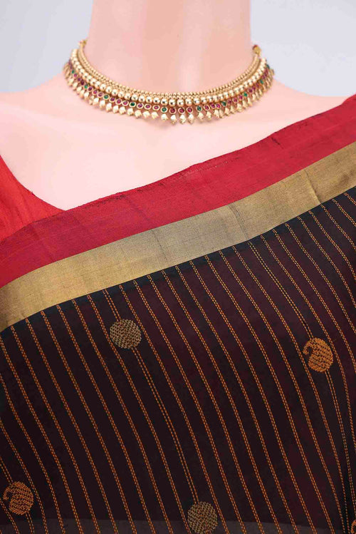 Border image of Black Coimbatore Silk Cotton Saree with Stripes on the body and Plain Border