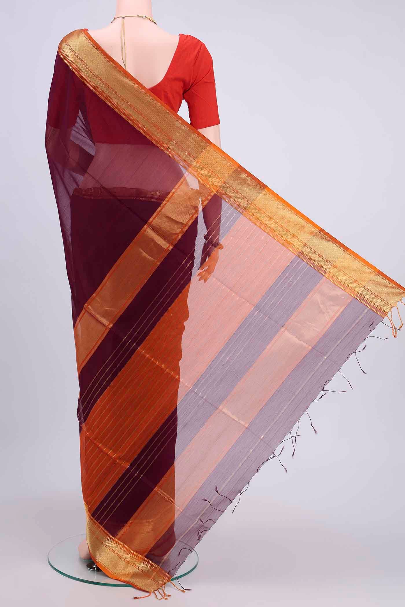 Flat view of Burgundy Maheshwari Silk Cotton Saree with Plain Body and Zari Border
