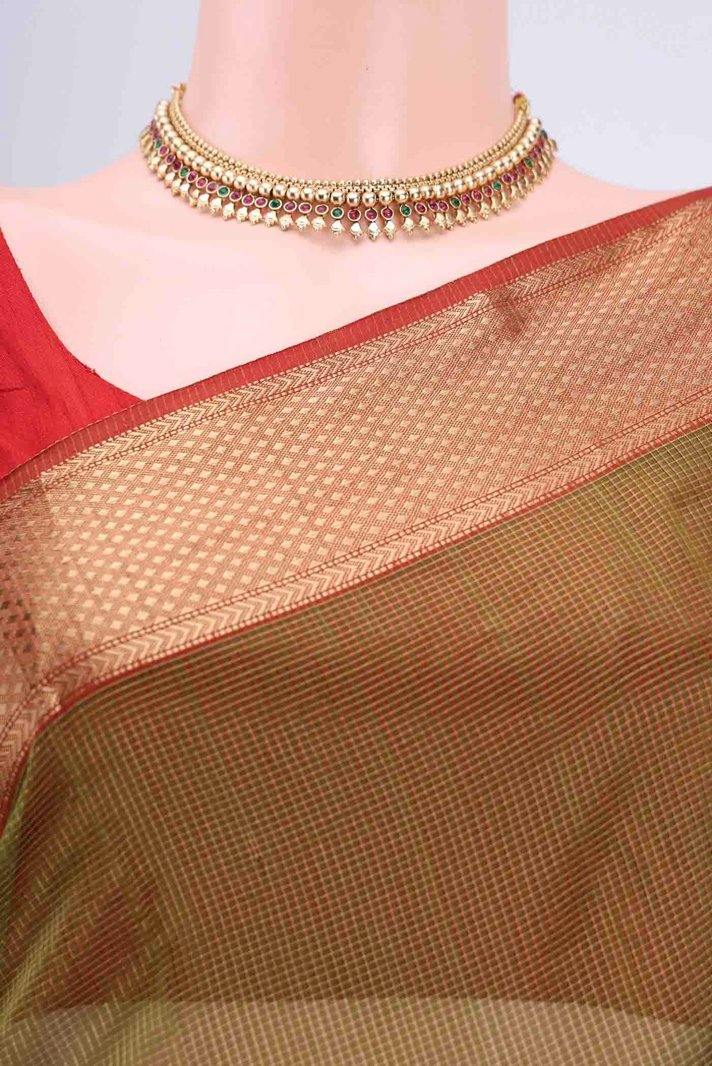 Border image of Mehandi Green Maheshwari Silk Cotton Saree with Checked design on the body and Zari Border
