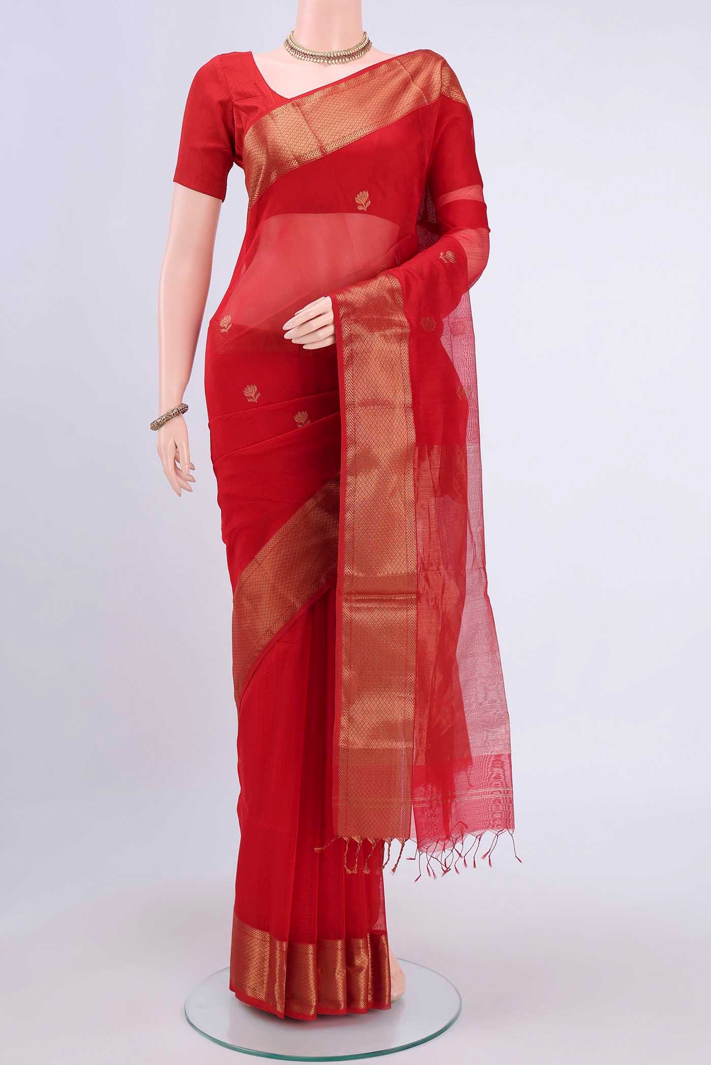 Red Maheshwari Silk Cotton Saree with Zari Butta on the body and Zari Border displayed on a mannequin