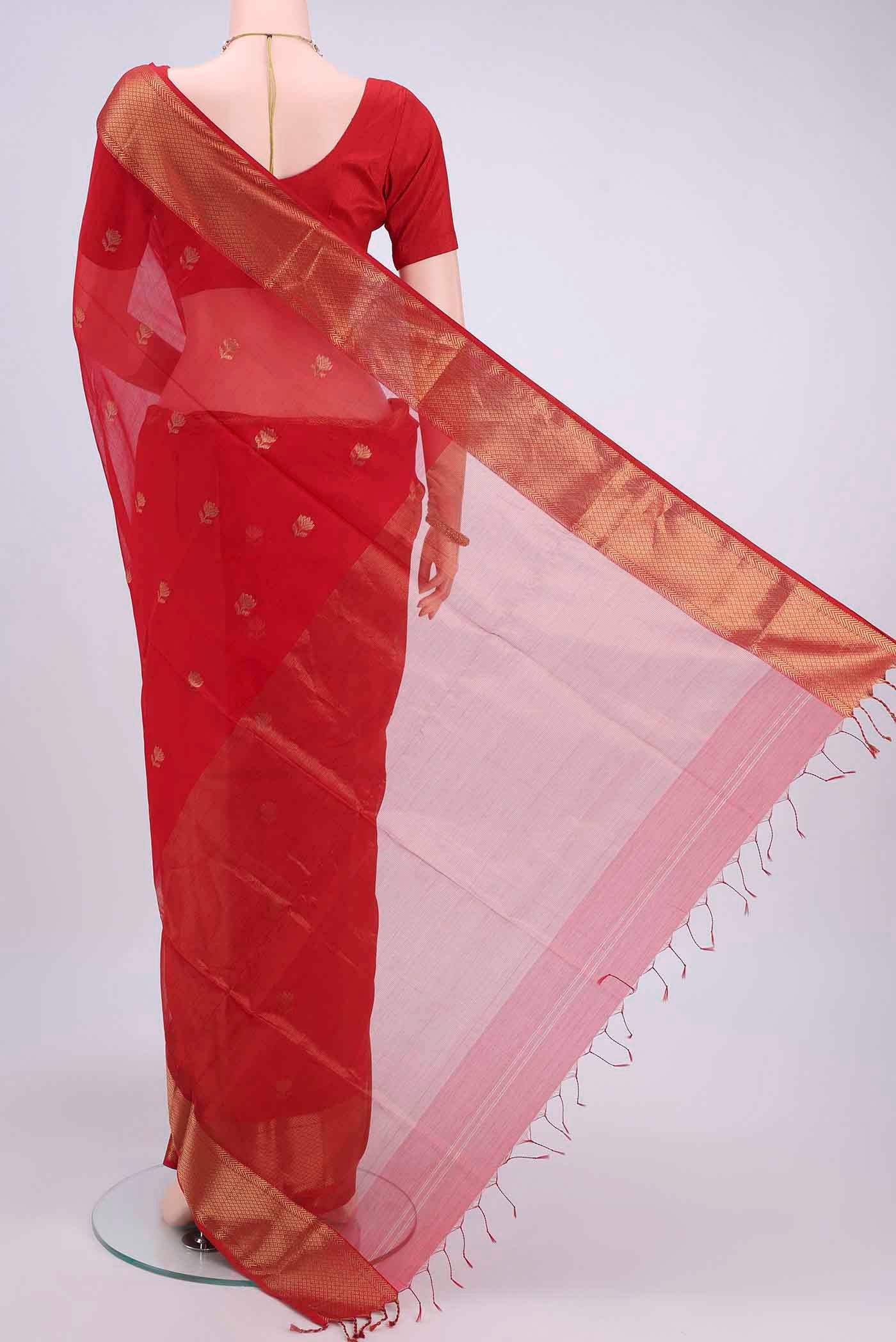 Flat view of Red Maheshwari Silk Cotton Saree with Zari Butta on the body and Zari Border
