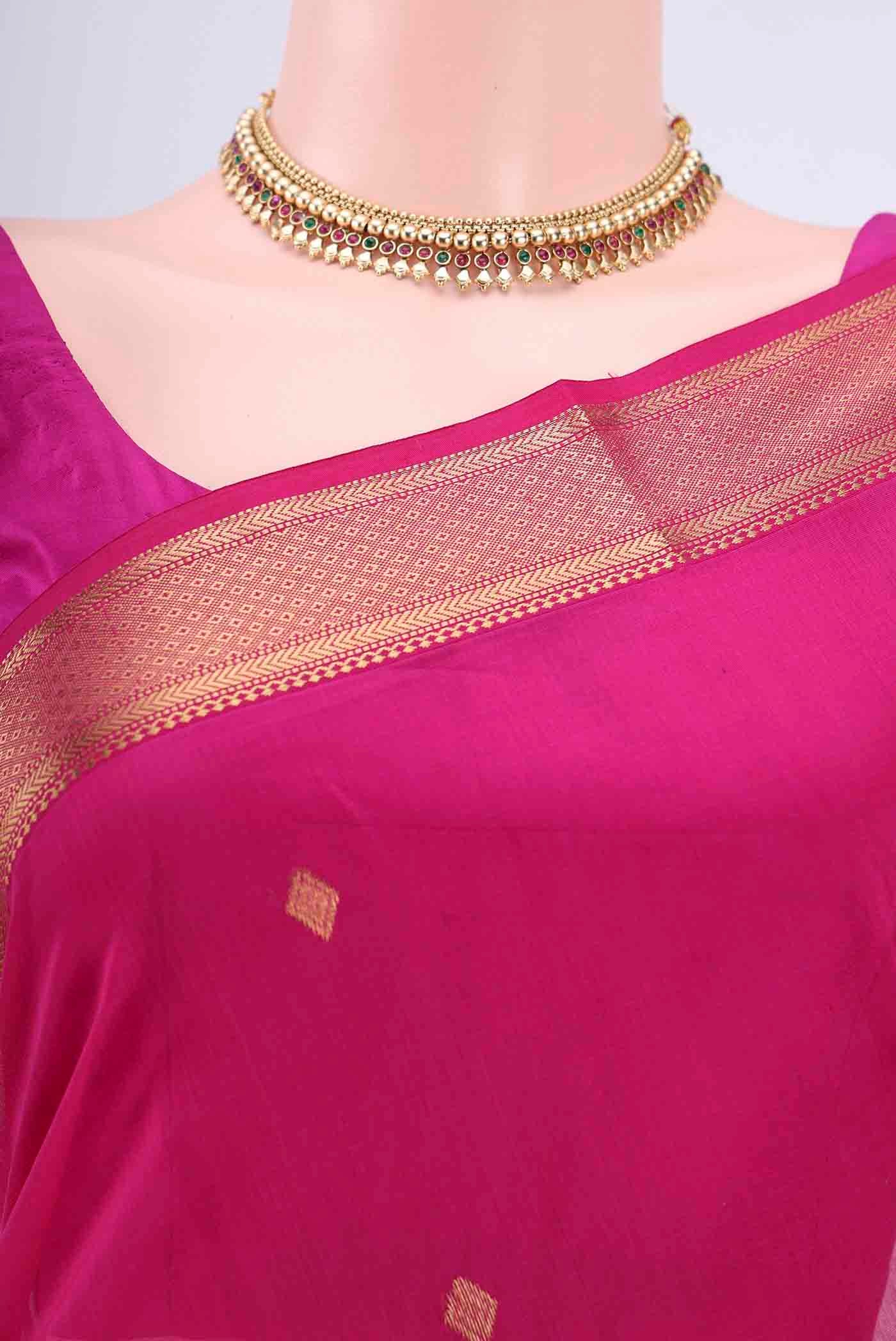 Border image of Rani Pink Maheshwari Silk Cotton Saree with Zari Butta on the body and Zari Border