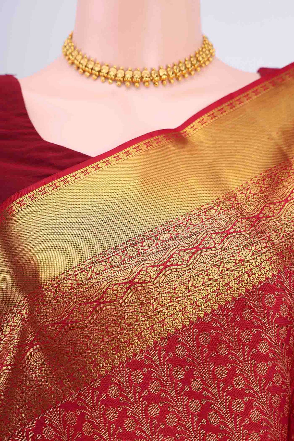 Border image of Red Kanchipuram Silk Saree with Zari Brocade on the body and Zari Border