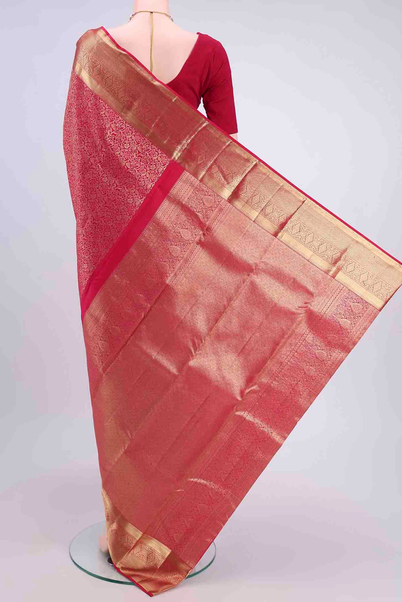 Flat view of Dark Pink Kanchipuram Saree with Zari Brocade on the body and Zari Border