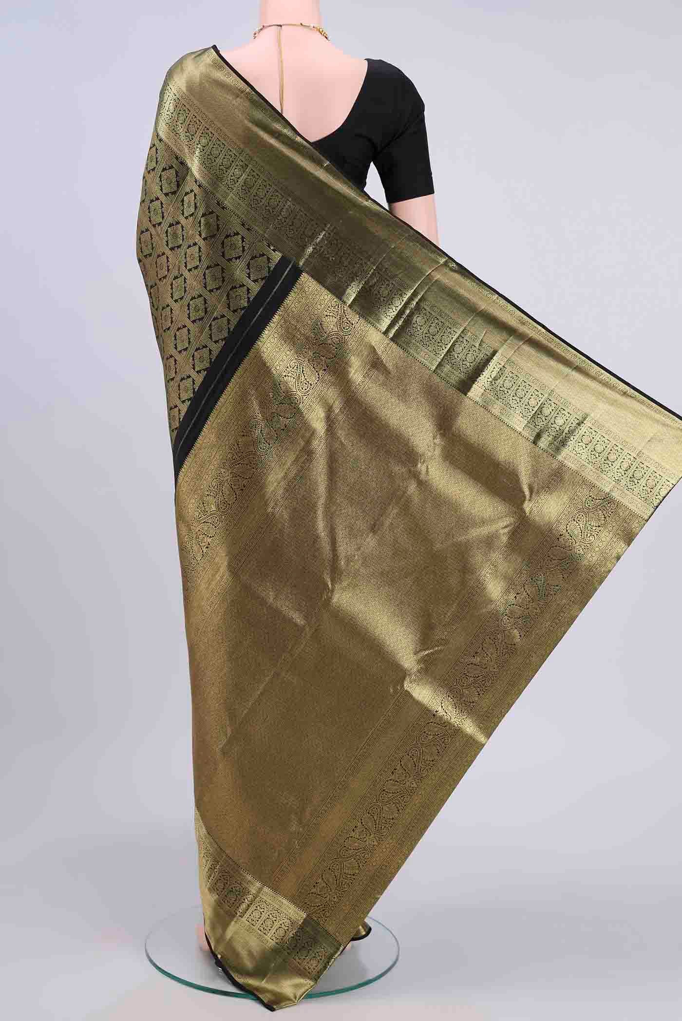 Flat view of Black Kanchipuram Saree with Zari Brocade on the body and Zari Border