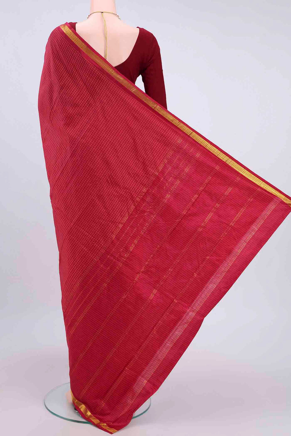 Flat view of Maroon Kanchipuram Silk Saree with Checked design on the body and Zari Border