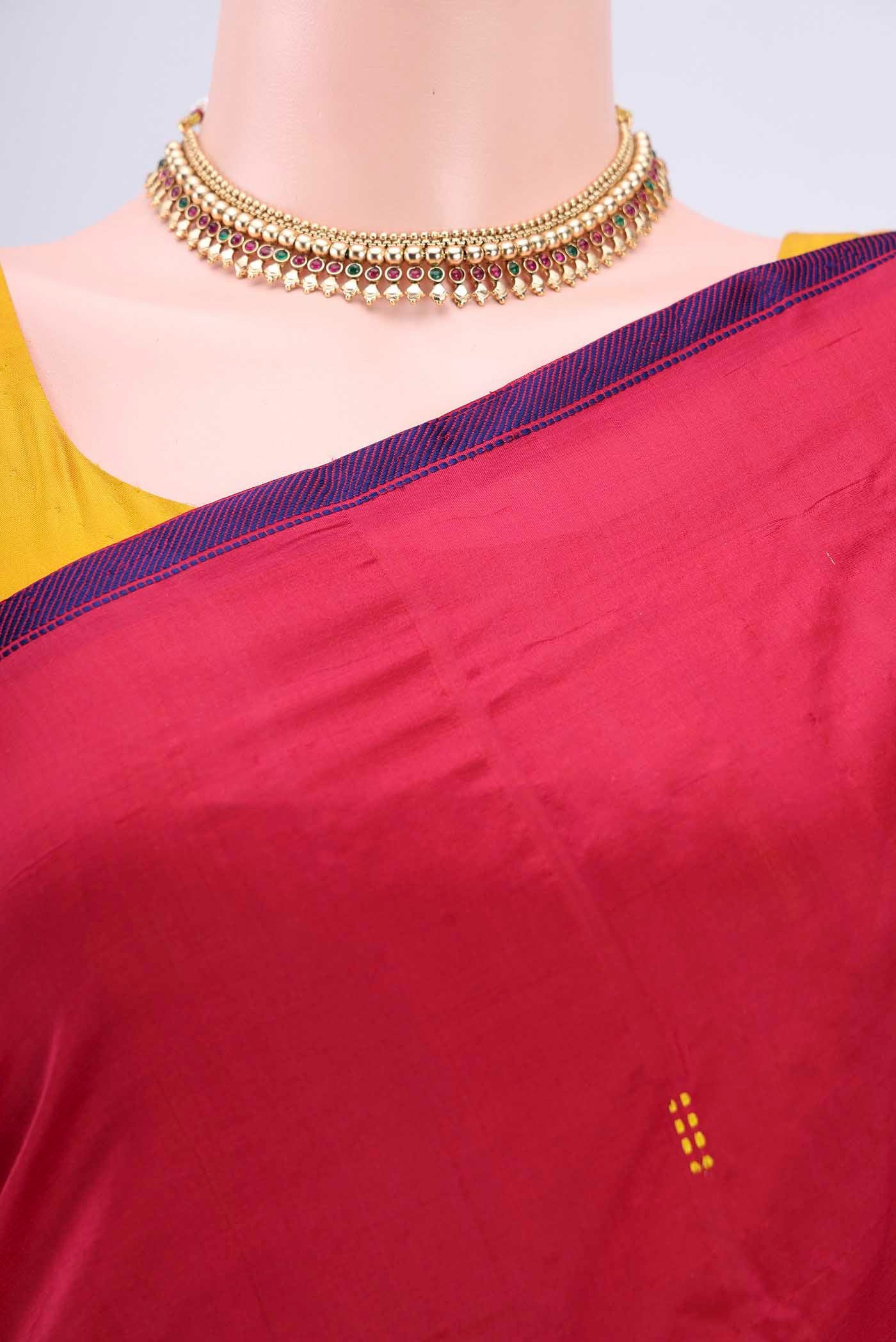 Border image of Maroon Kanchipuram Silk Saree with Thread Butta on the body and Zari Border