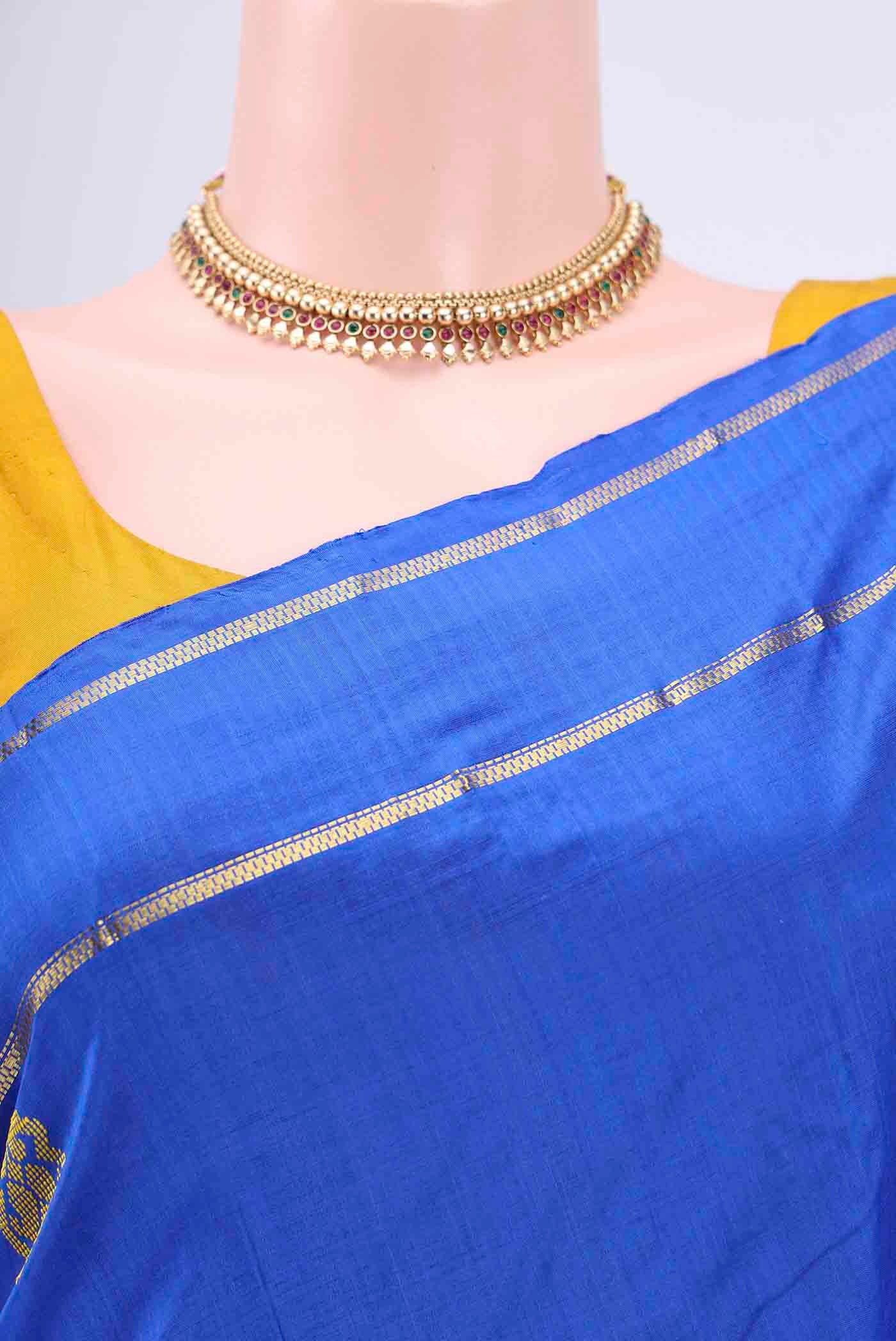 Border image of Royal Blue Kanchipuram Silk Saree with Plain Body and Zari And Thread Border