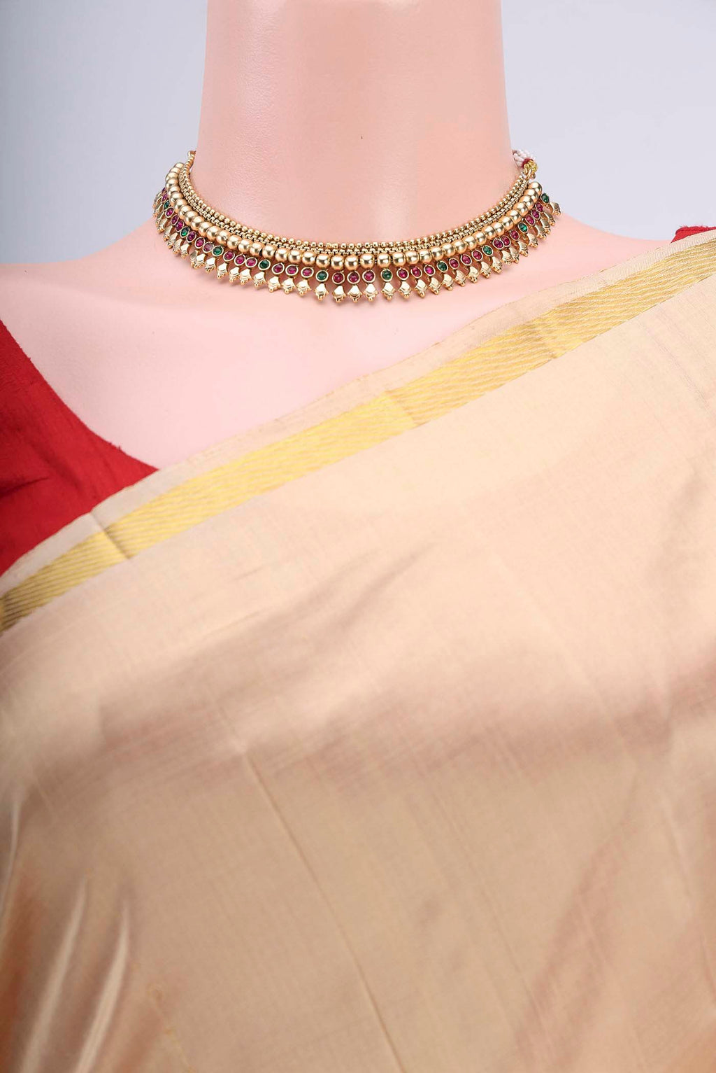 Border image of Beige Kanchipuram Silk Saree with Thread Butta on the body and Zari Border