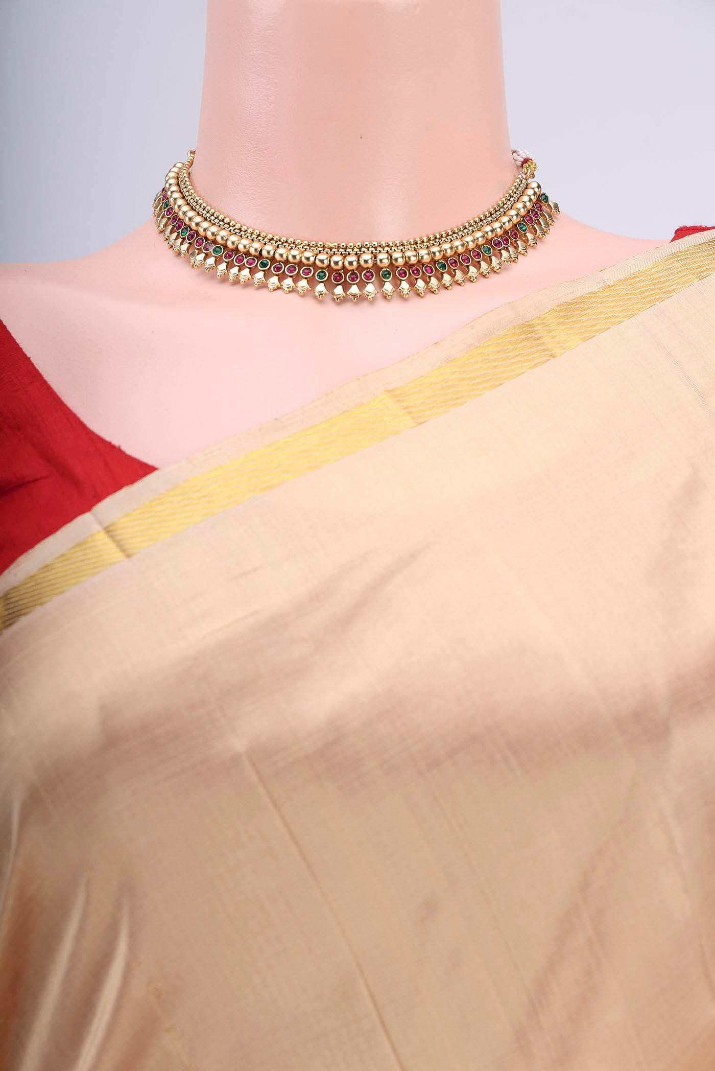 Border image of Beige Kanchipuram Silk Saree with Thread Butta on the body and Zari Border