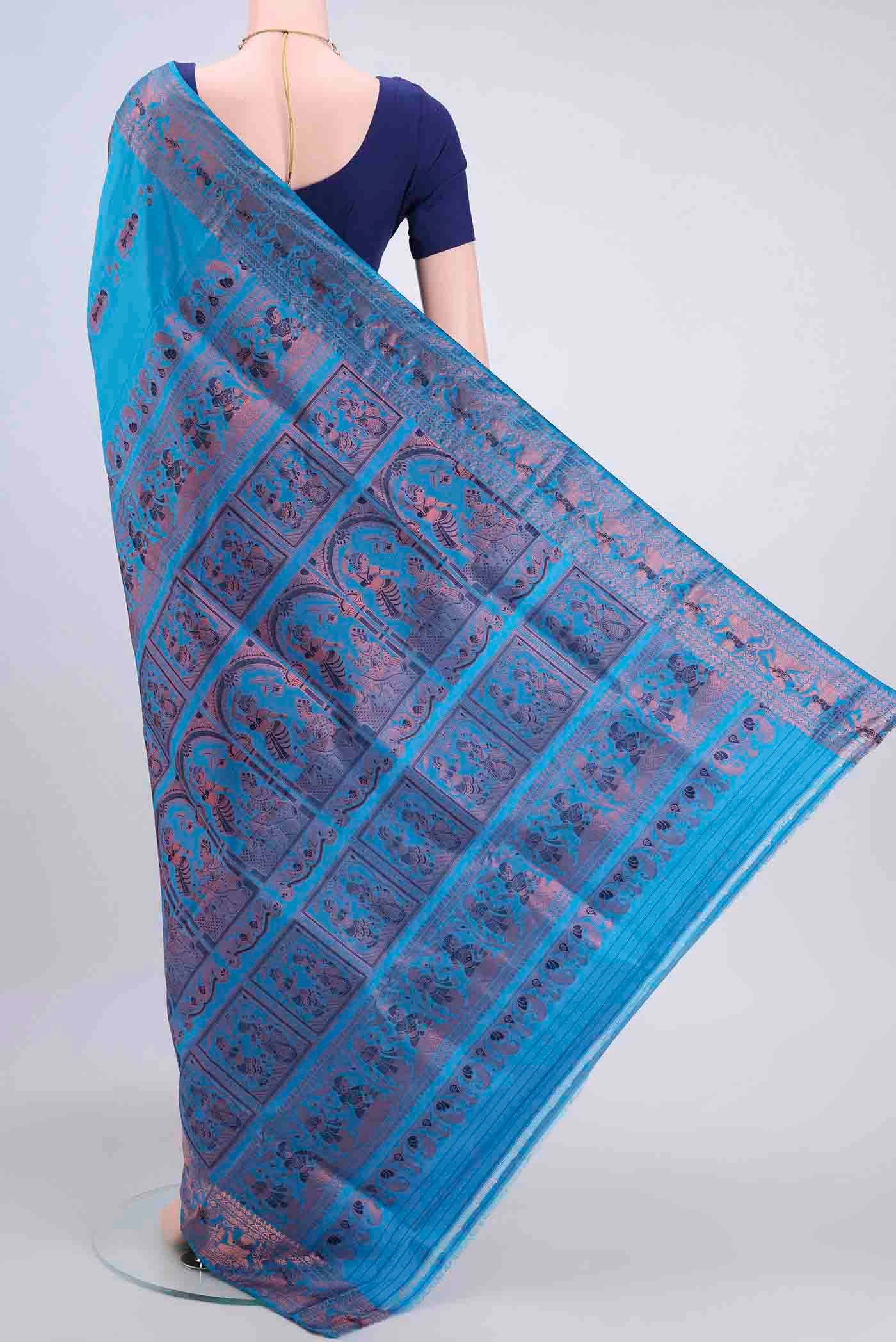 Flat view of Blue Baluchari Silk Saree with Zari And Thread Butta on the body and Zari Border