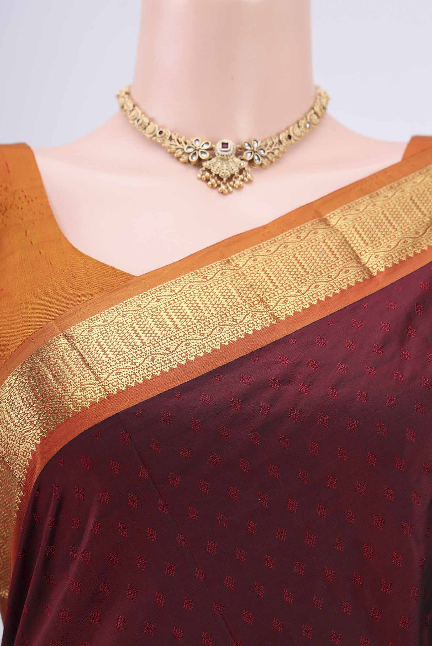 Border image of Maroon Dual Tone Blended Bangalore Silk Saree with Jacquard design on the body and Zari Border. 