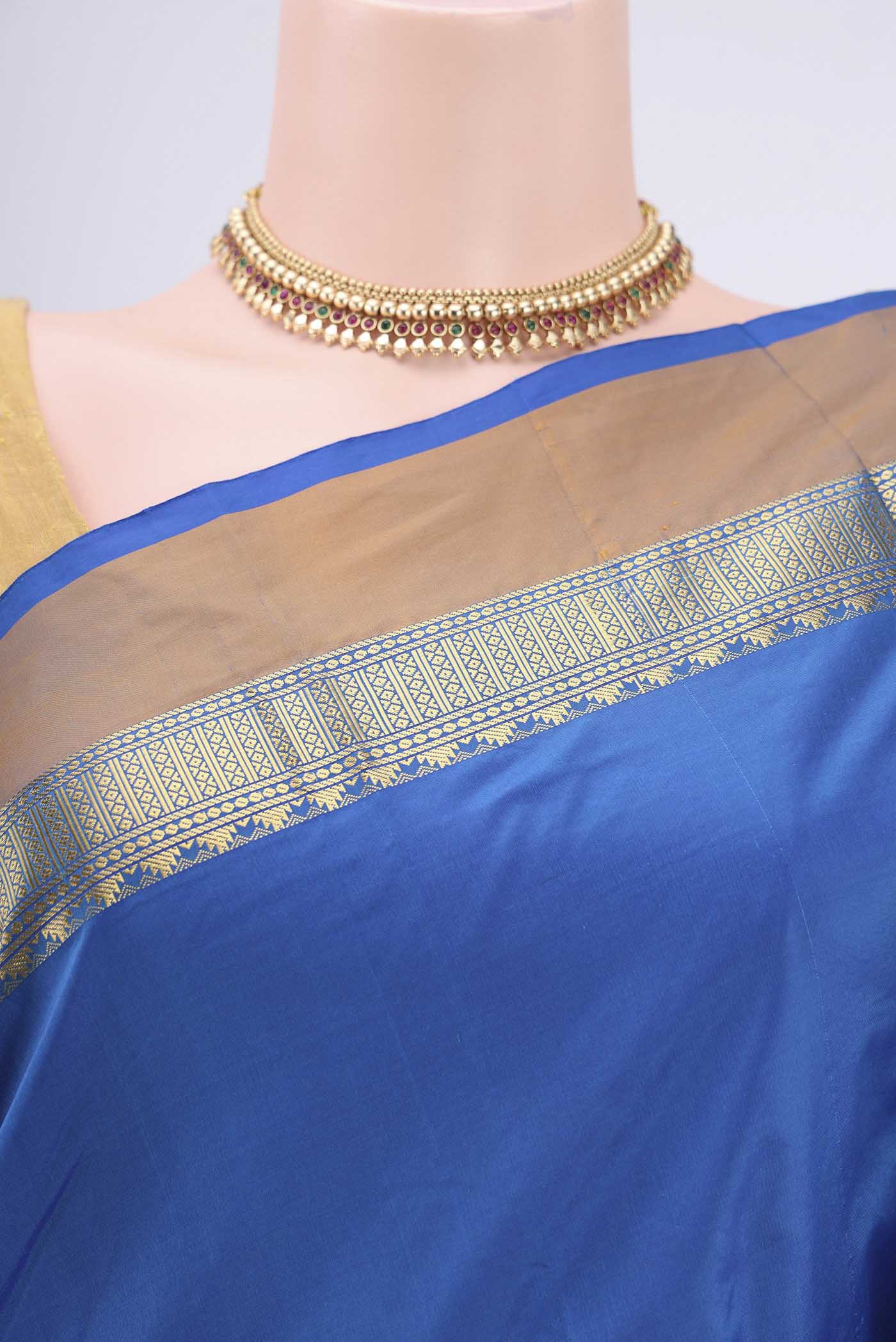 Border image of Royal Blue Blended Bangalore Silk Saree with Zari Butta on the body and Zari Border. 